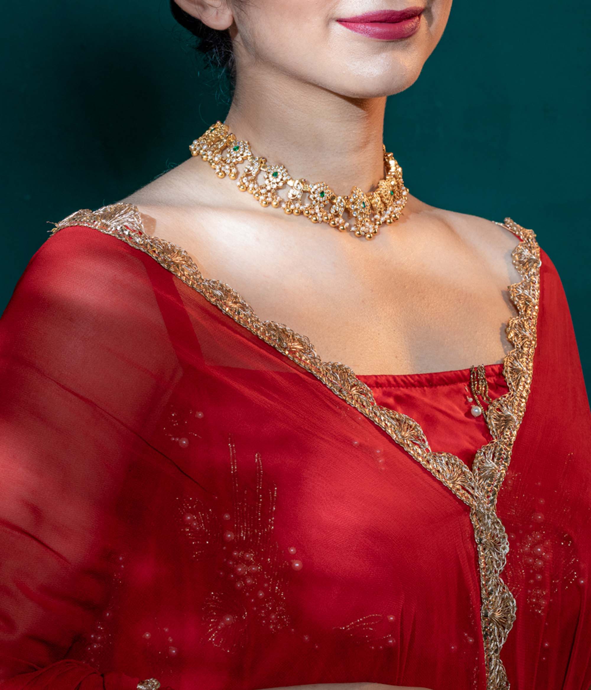 Aaharya green necklace with sterling silver and green cut stones