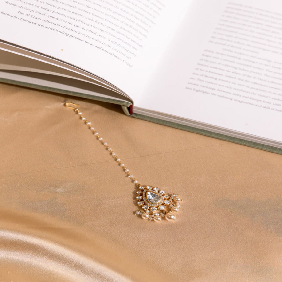 Aanya handmade silver maangtikka with Polki stones and pearls