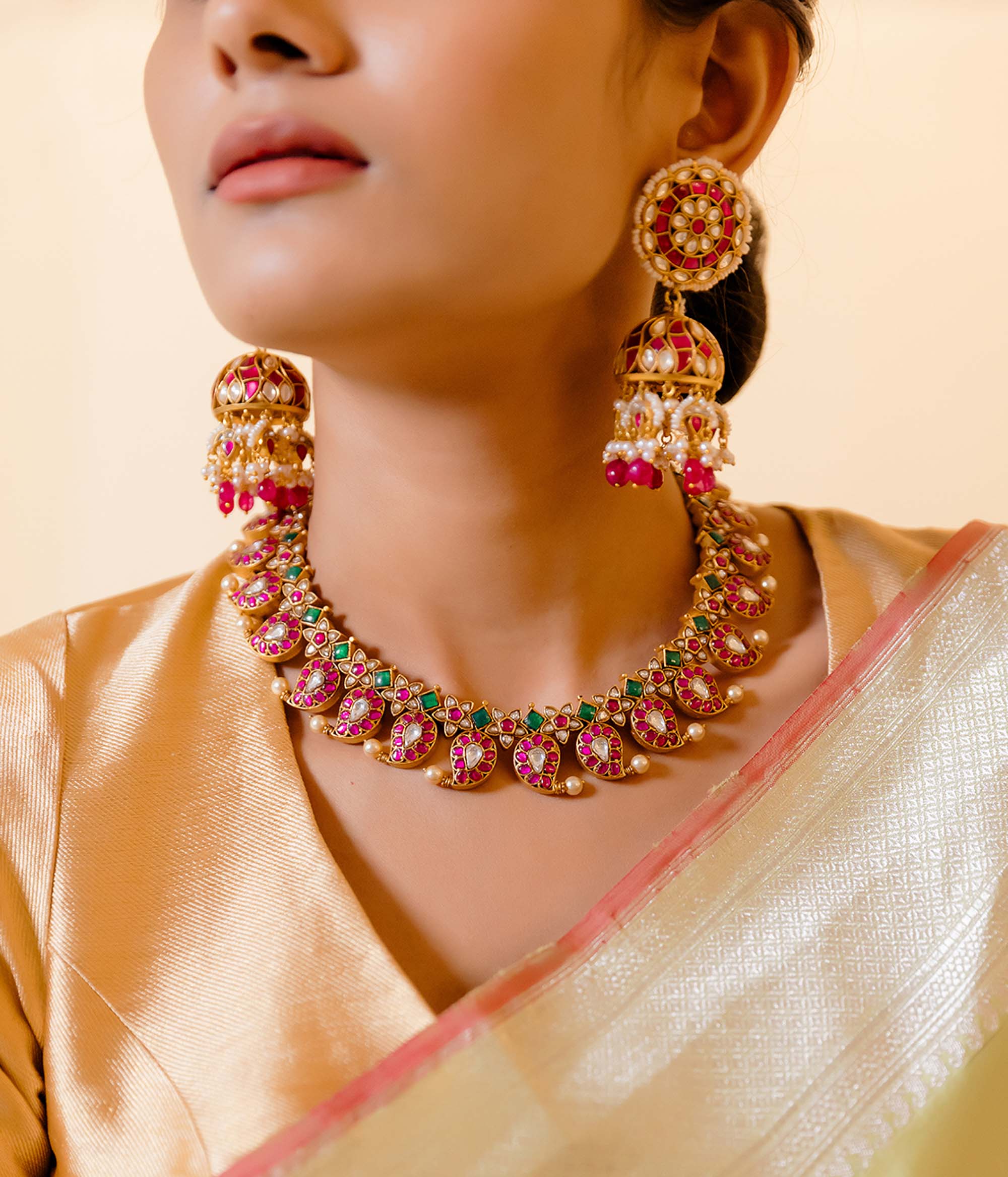 Handcrafted Kundan necklace with red, green, and white stones by DivasMantra