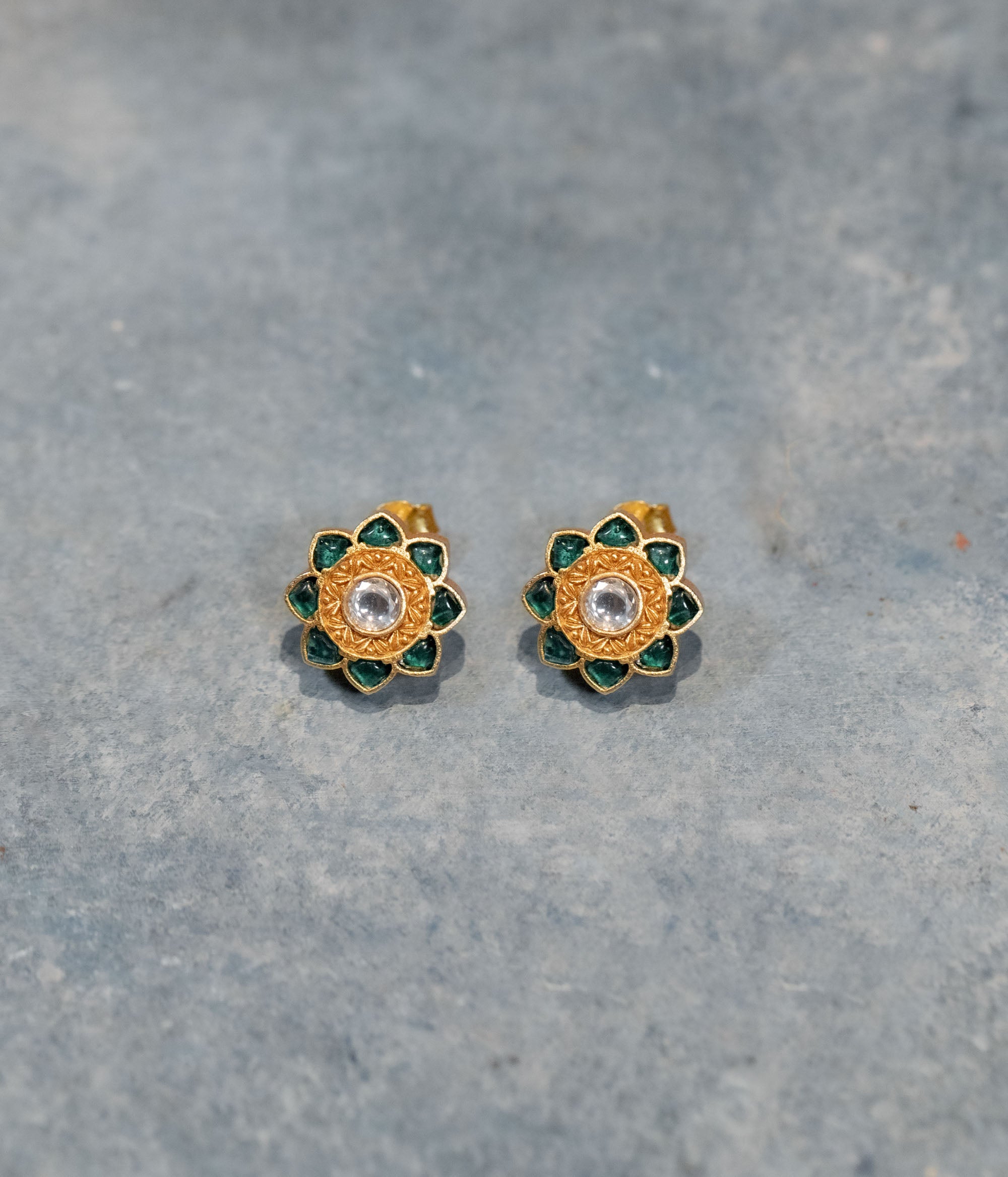 Handmade silver stud earrings with green and white kundan stones