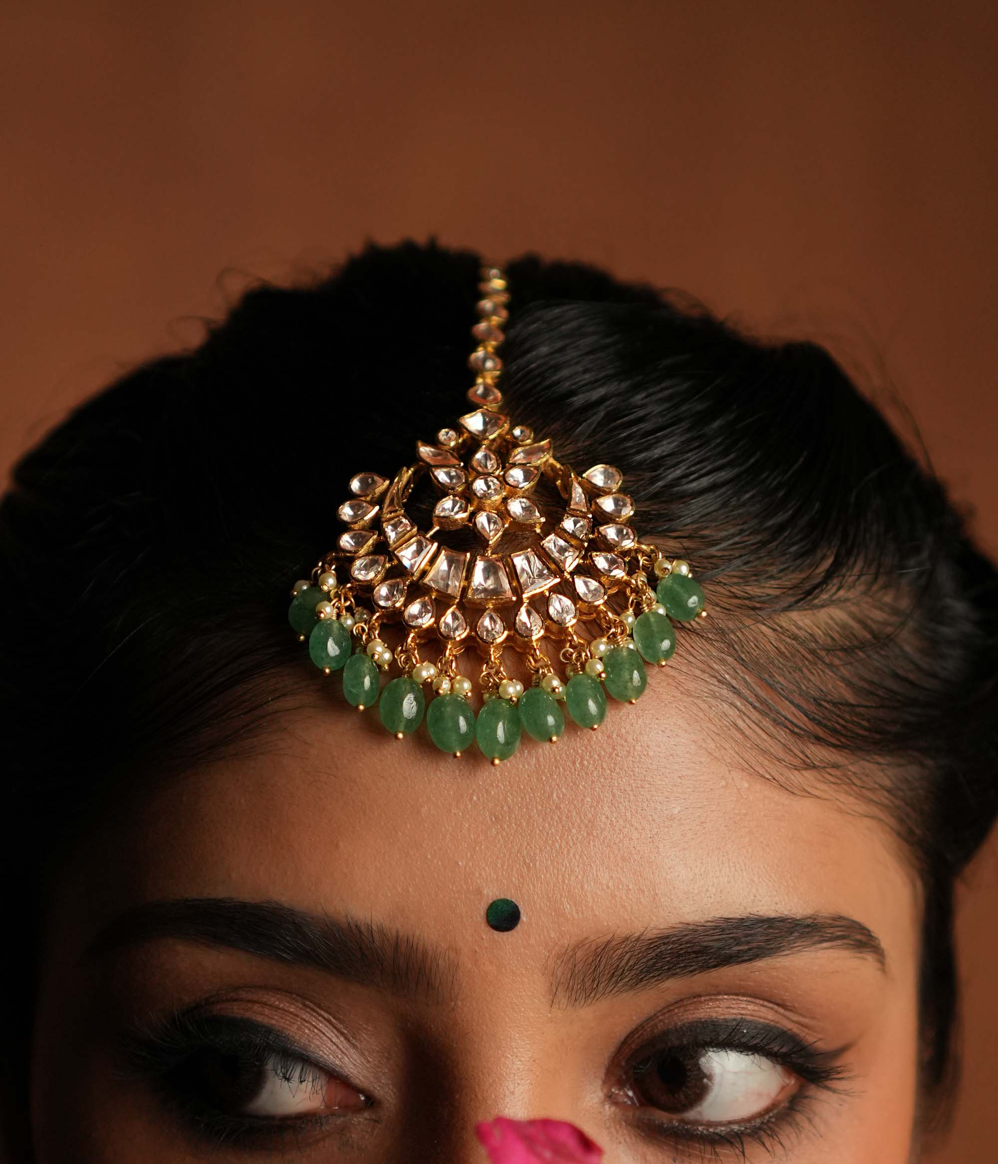 Polki and pearl forehead jewelry for weddings