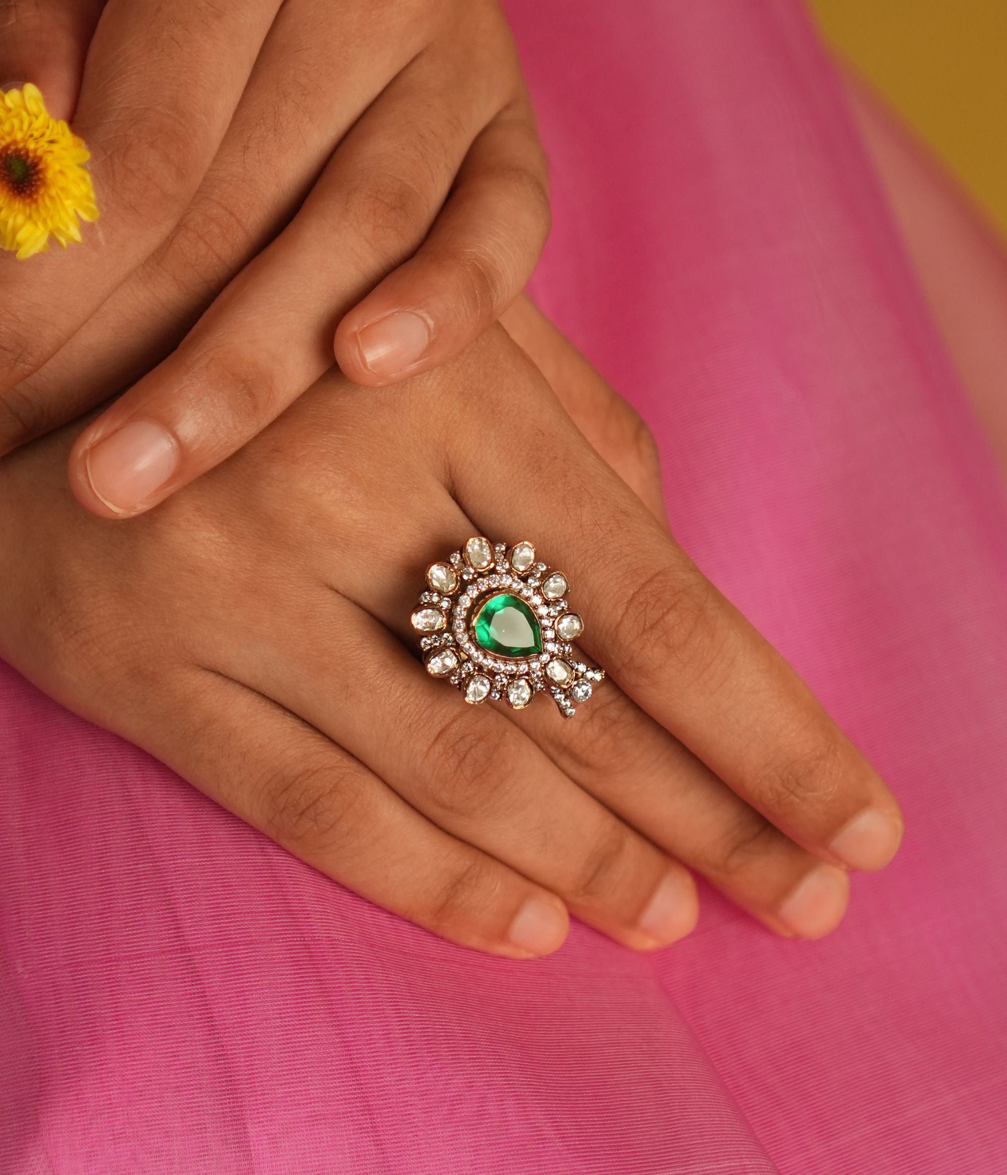 92.5 sterling silver ring with CZ stones
Traditional green stone ring from DivasMantra