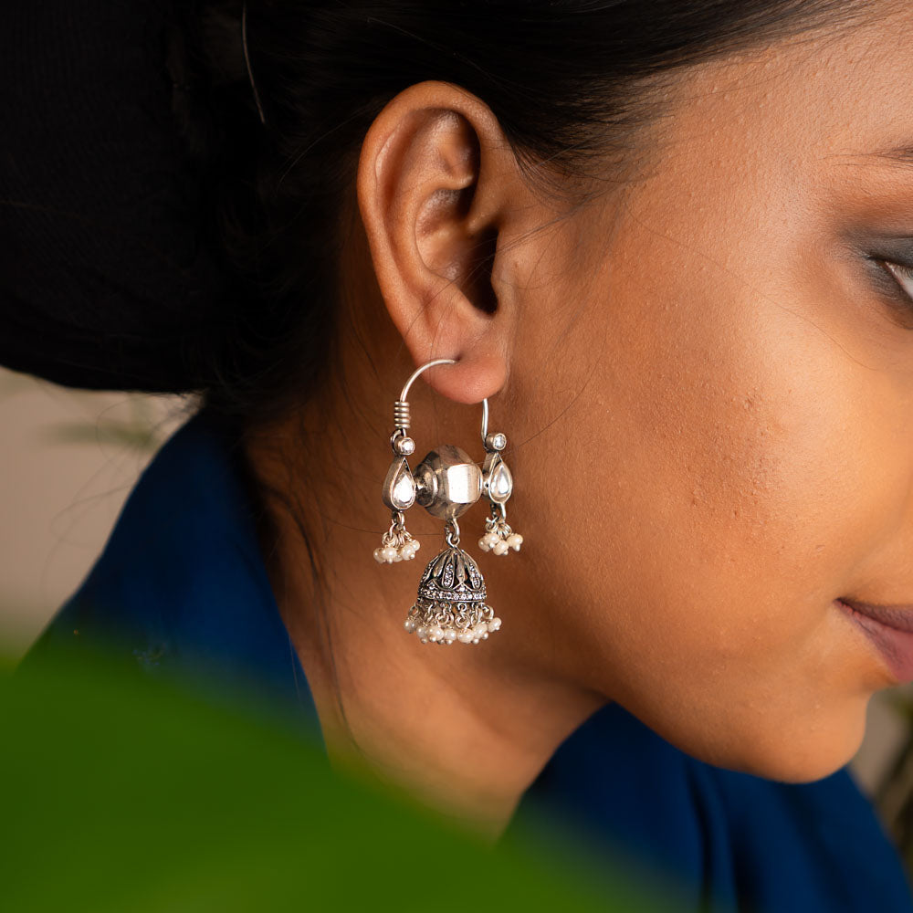 These dangler earrings, crafted with contemporary Indian motifs and techniques, beautifully capture the spirit of celebration and elegance.