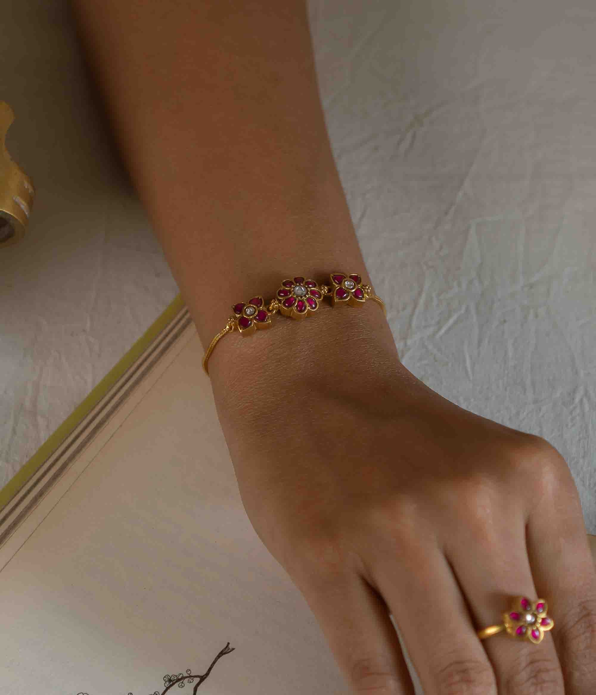 Close-up of Autumn Bracelet featuring White Kundan Stones and Gold Plating