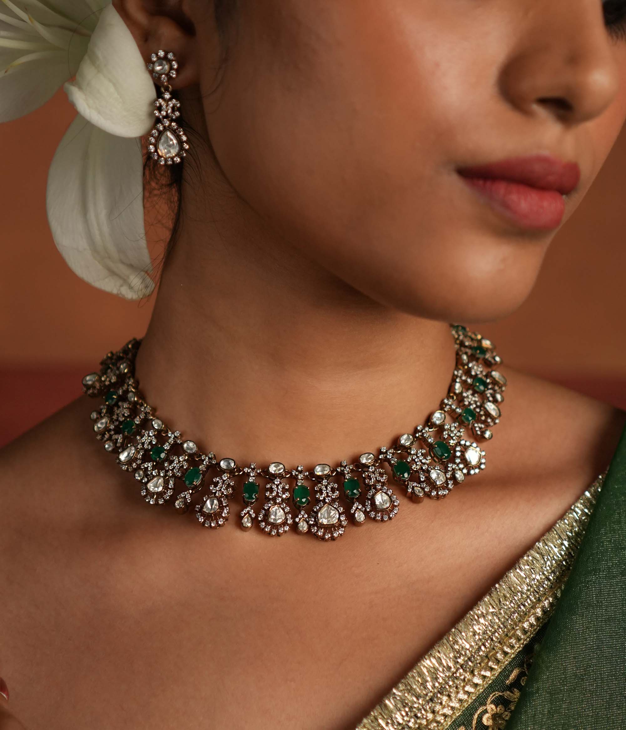 Close-up of green gemstones in Ava Silver Choker