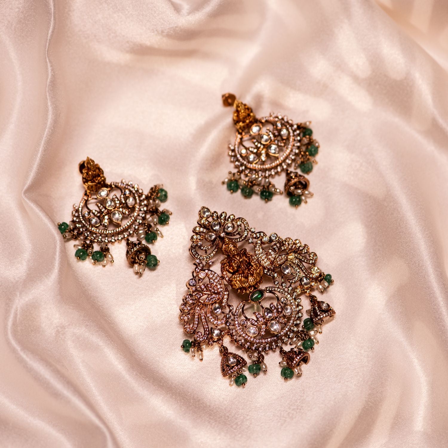 Avaa silver pendant with antique gold plating and Polki stones