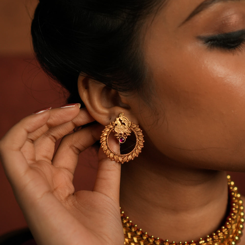Avery earrings in silver and gold with red spinal stone