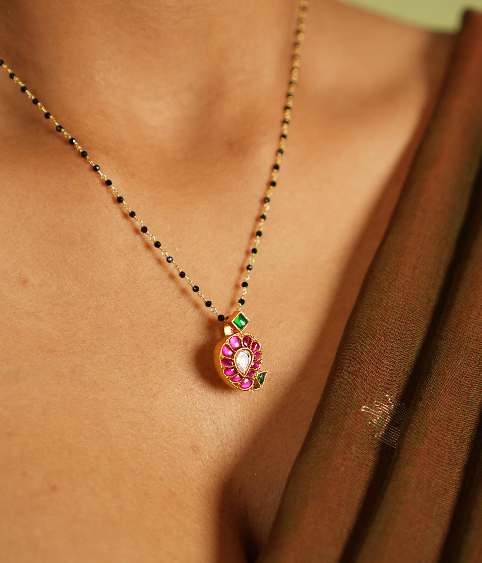 Handcrafted silver mangalsutra with gold plating and black beads