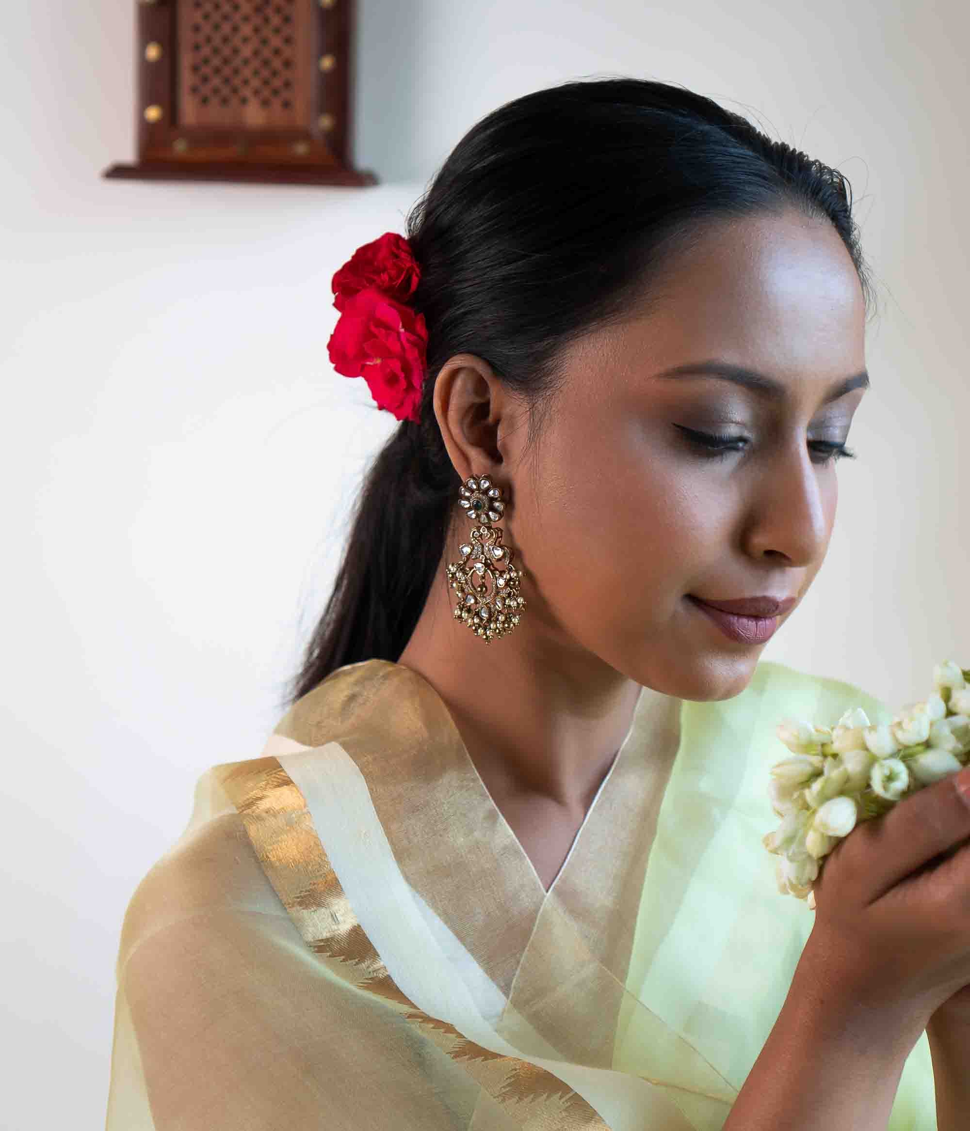 Close-up of Bella Earrings with Carved Drop Detail