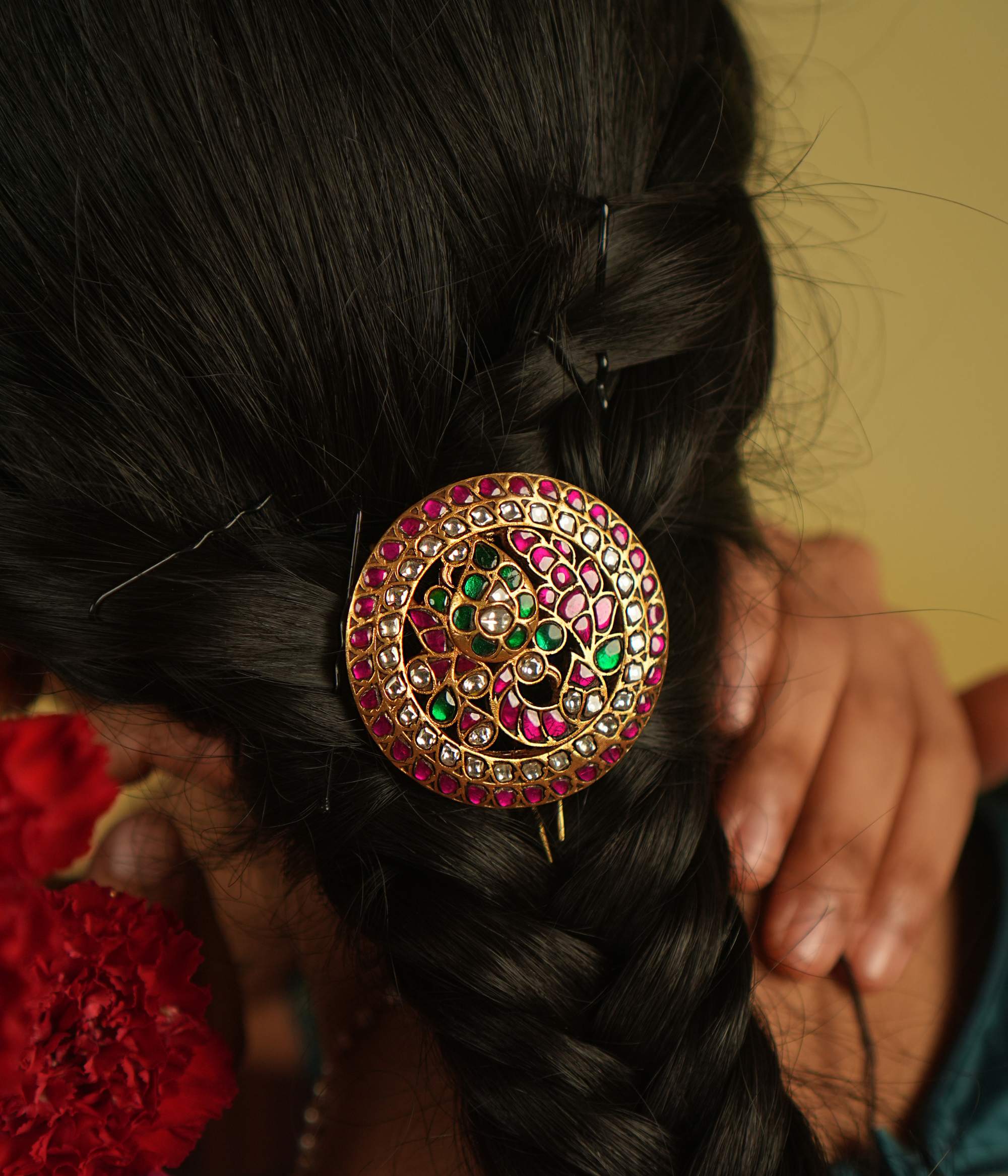 Gracefully worn, this hairpin adorned with red and white Kundan stones enhances any hairstyle, reflecting the beauty of timeless craftsmanship.