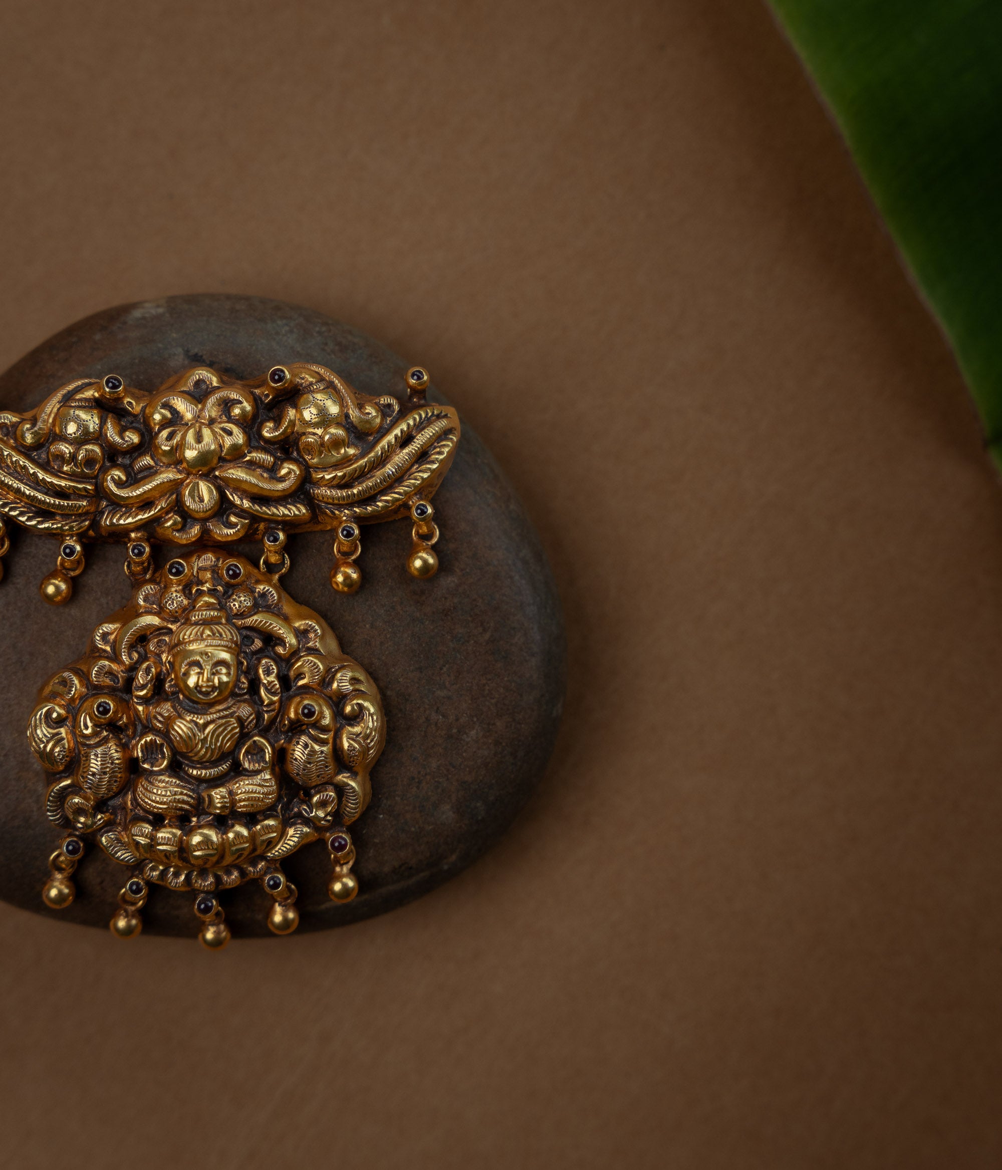 Temple pendant with twin peacocks and Garuda, studded with Red Spinal Stones