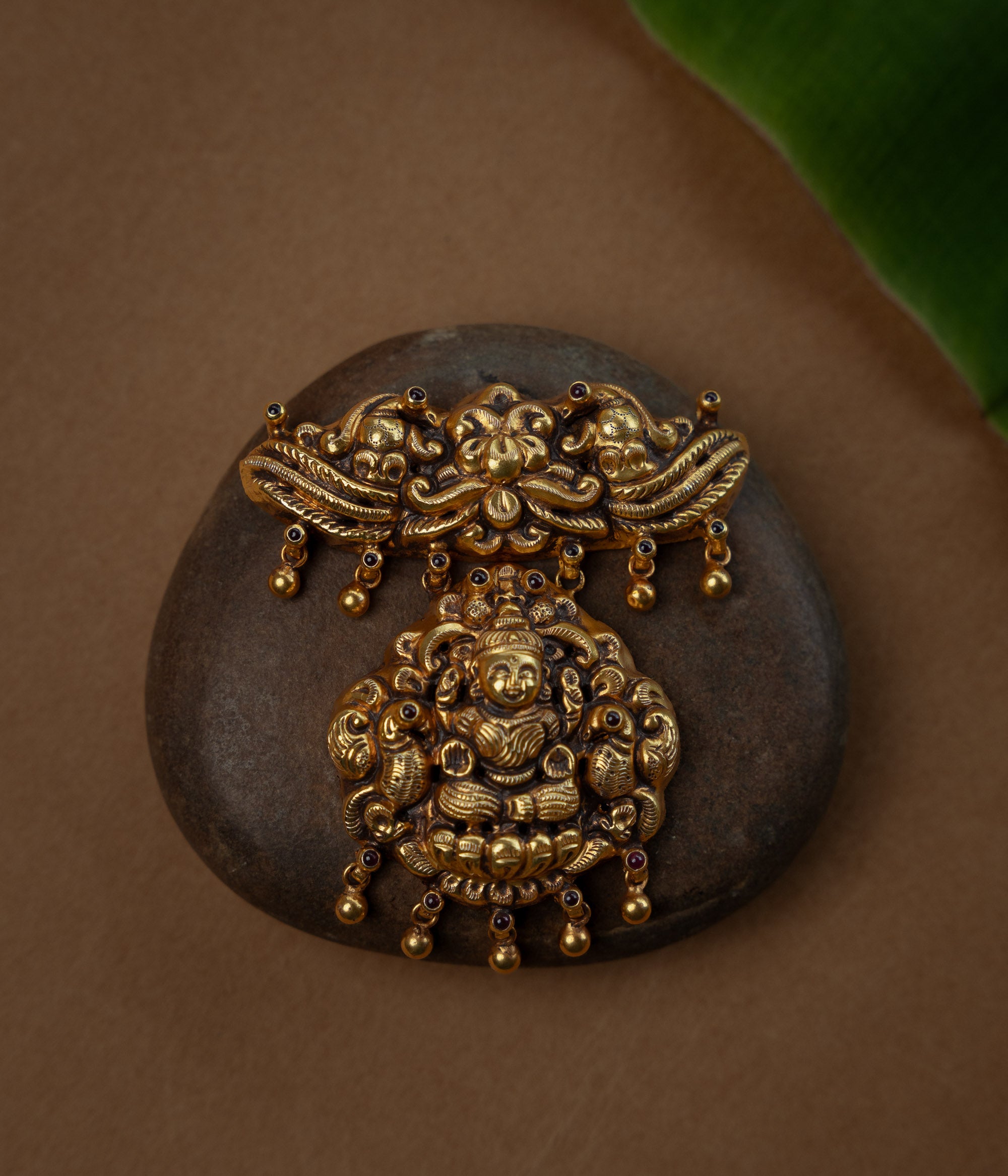 Temple pendant with twin peacocks and Garuda, studded with Red Spinal Stones