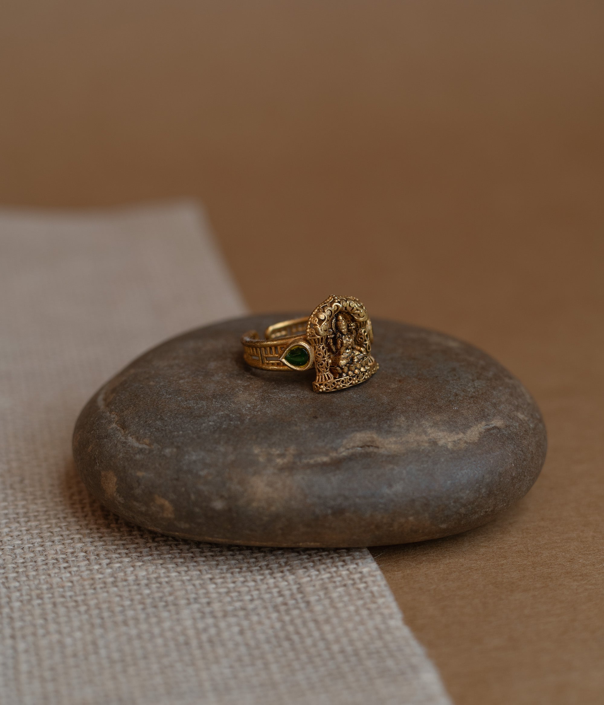 Temple collection ring with green Spinal stone in elegant temple-inspired craftsmanship.