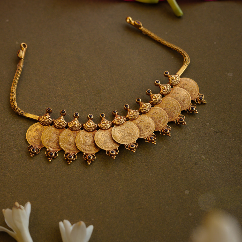 Antique Lakshmi coin temple necklace with Red Spinel stones, inspired by traditional South Indian heritage.