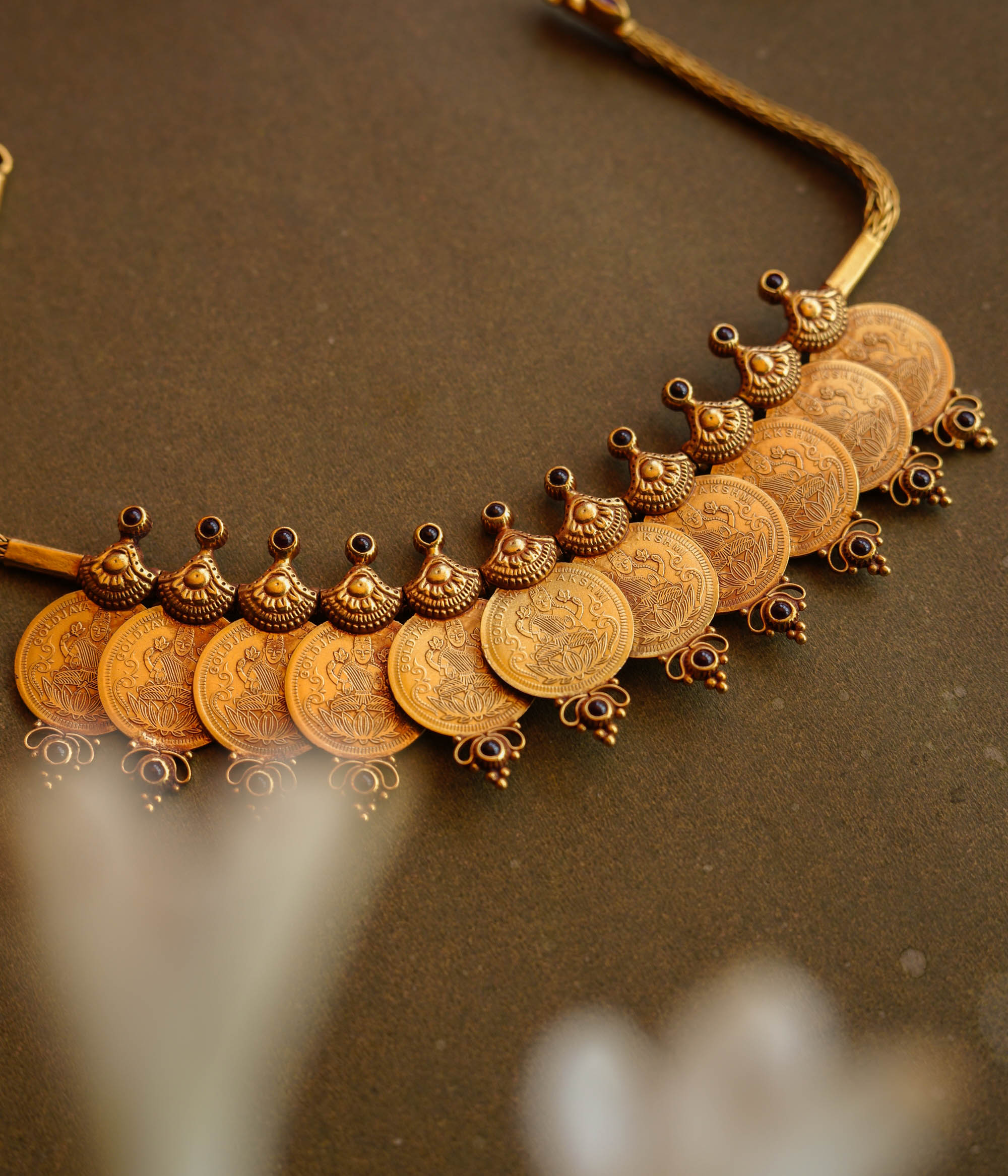 Antique Lakshmi coin temple necklace with Red Spinel stones, inspired by traditional South Indian heritage.
