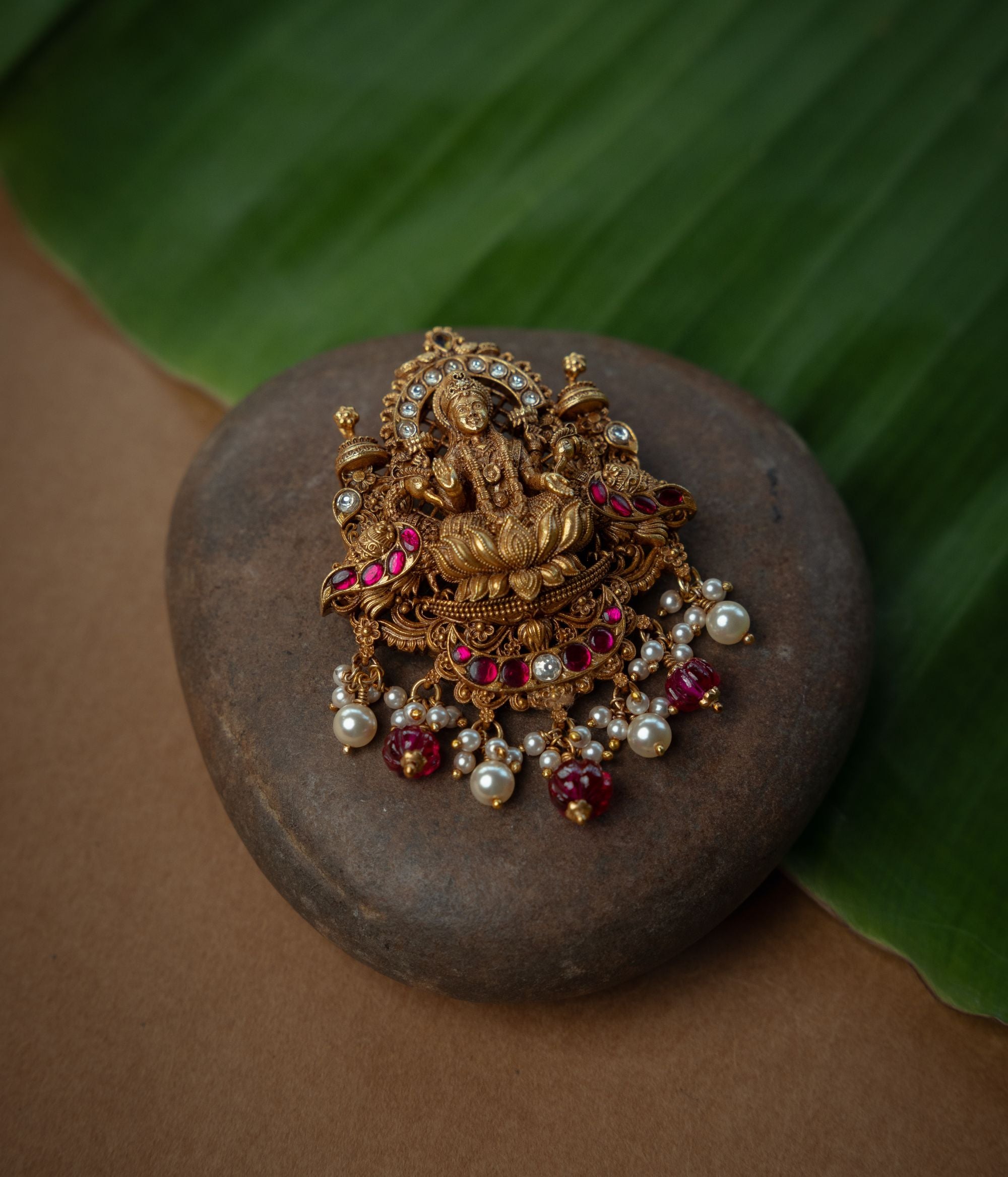 Temple style silver pendant with pearl accents