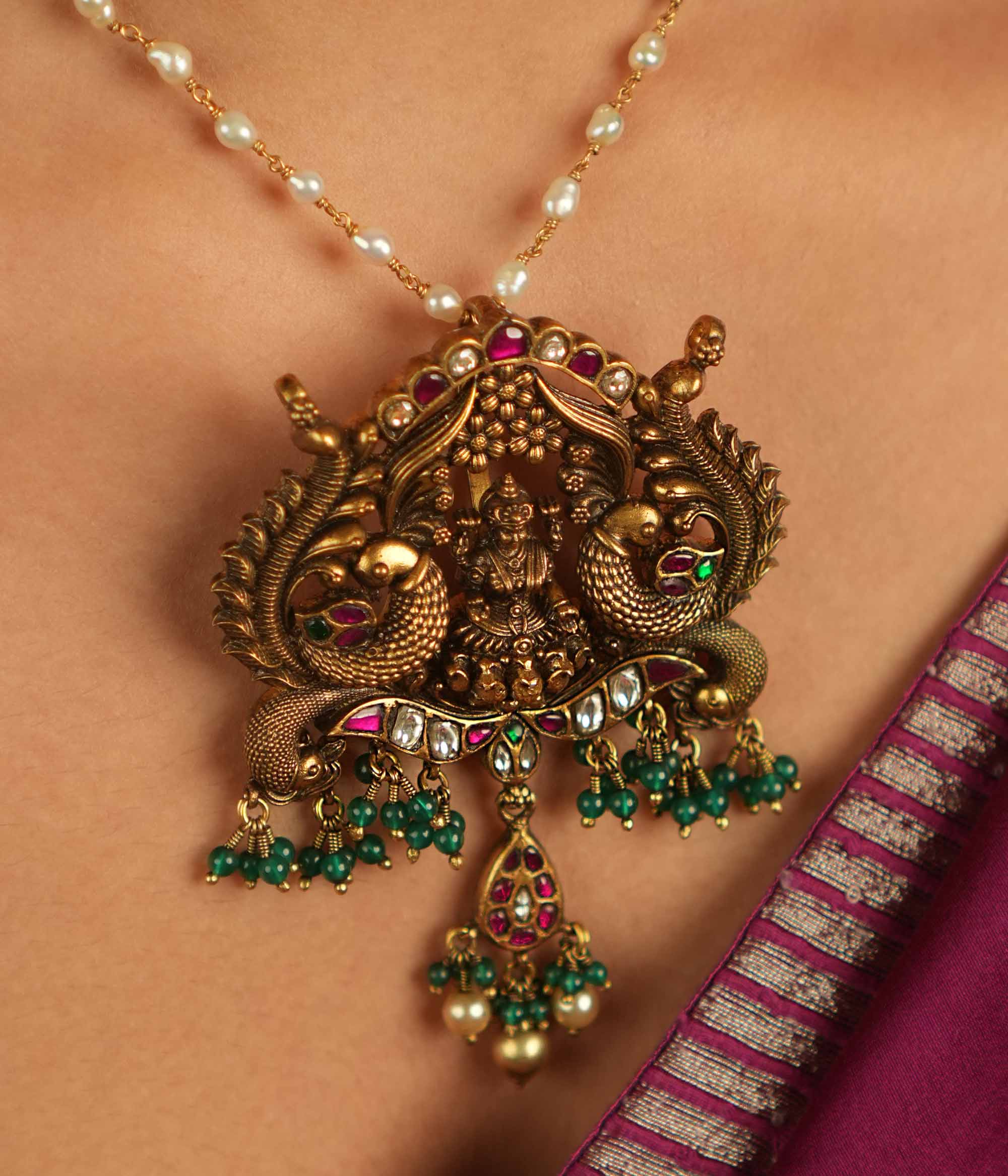 Close-up of Devastuti Kundan Pendant with Green Beads
