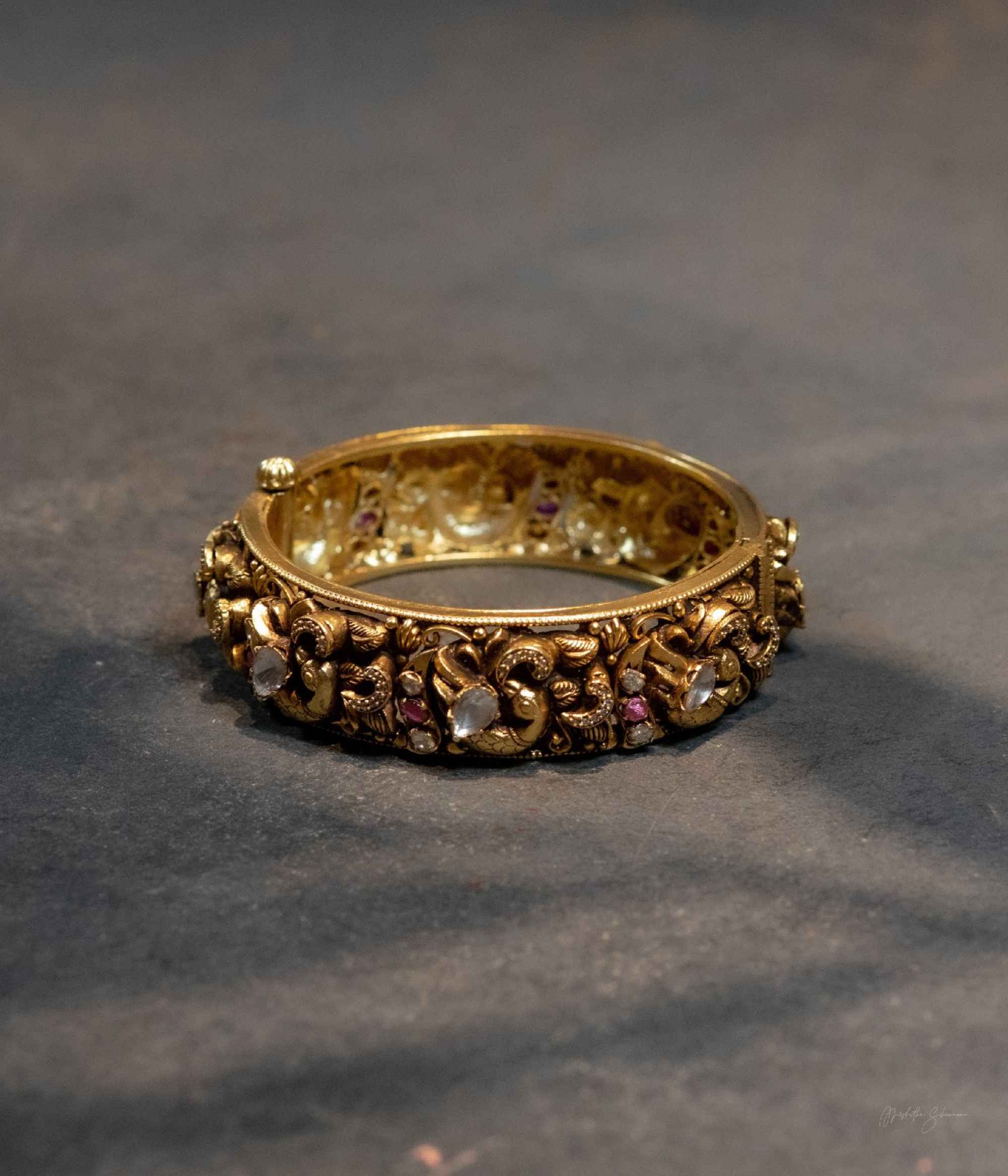 Handcrafted silver gold plated temple kada bangle with polki stones