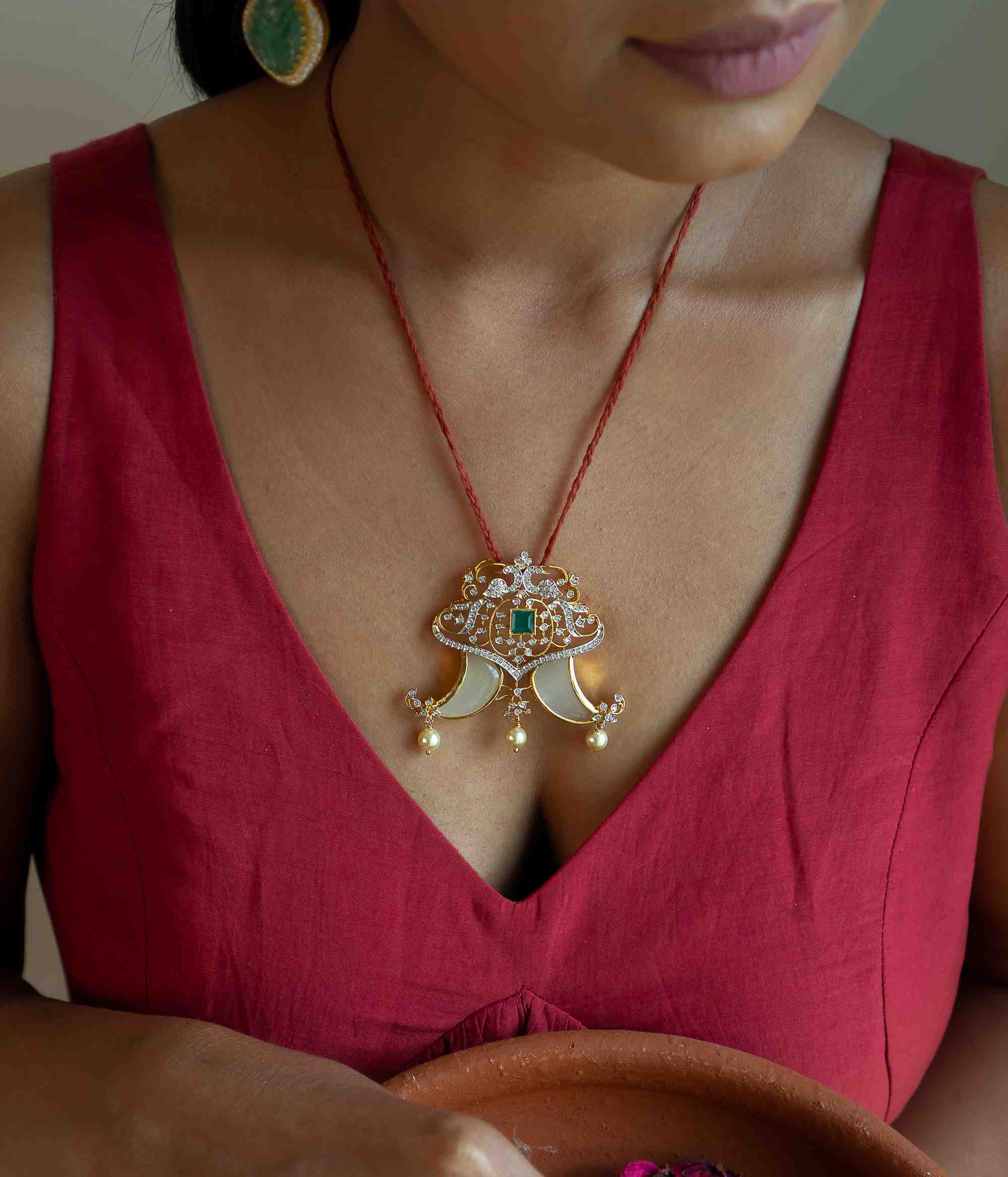 Handmade silver pendant with pearls, CZ stones, and green gemstones