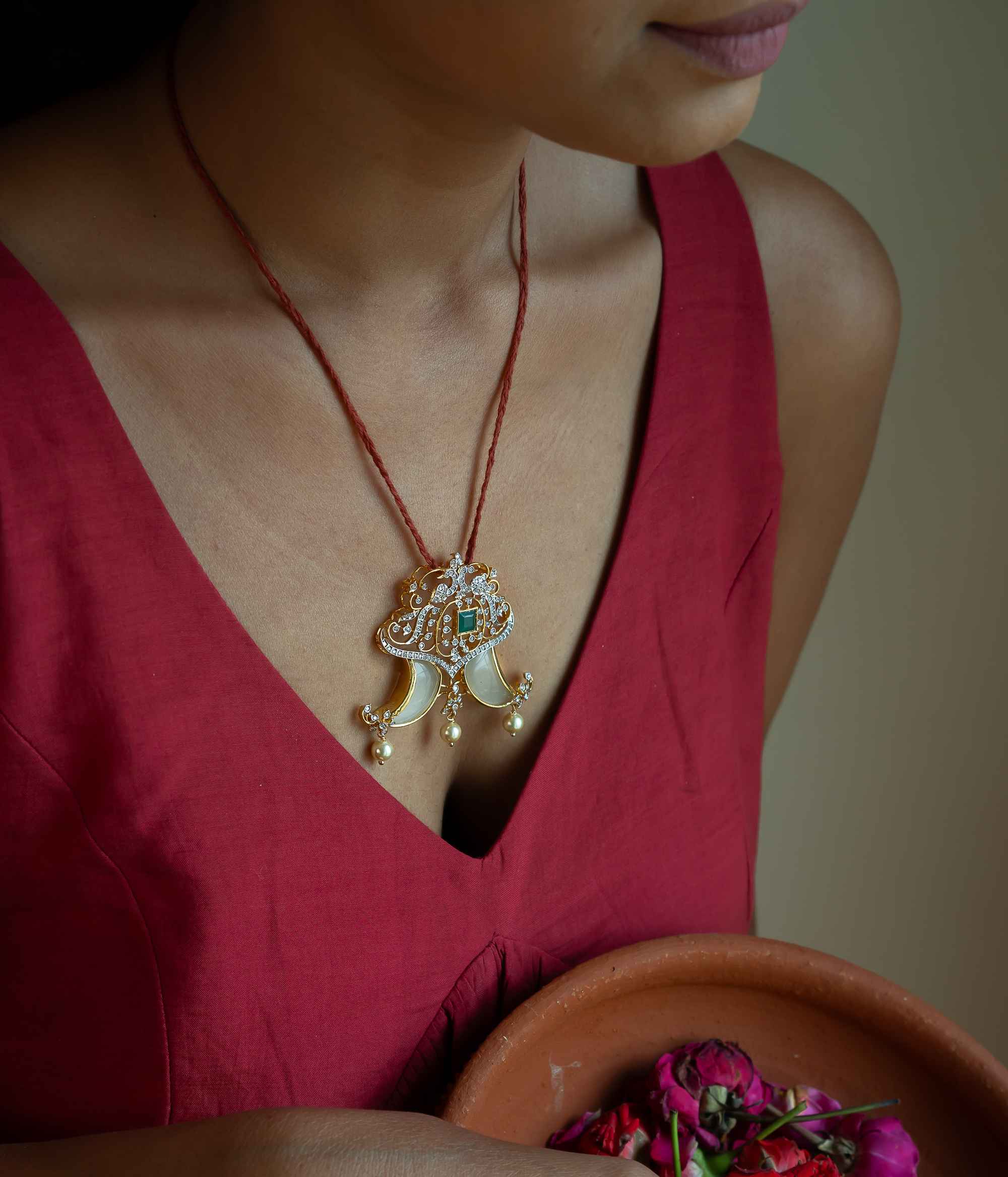 Traditional handcrafted silver pendant with green and CZ stones