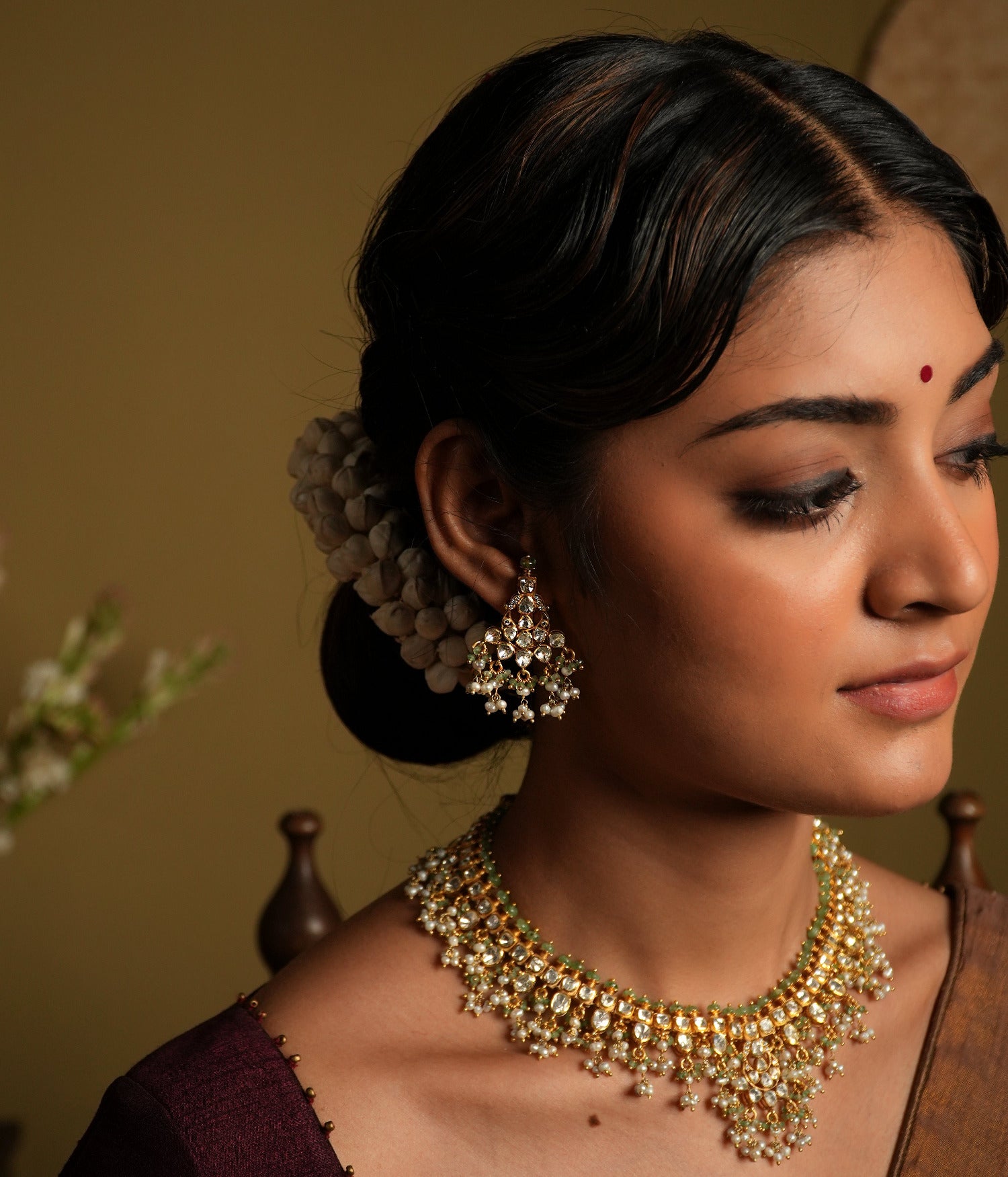 Elevate your elegance with these stunning moissanite Polki earrings, crafted with silver gold plating for a luxurious finish. Featuring intricately set hand-cut Polki stones, these earrings exude a regal charm with their dazzling brilliance and timeless appeal.