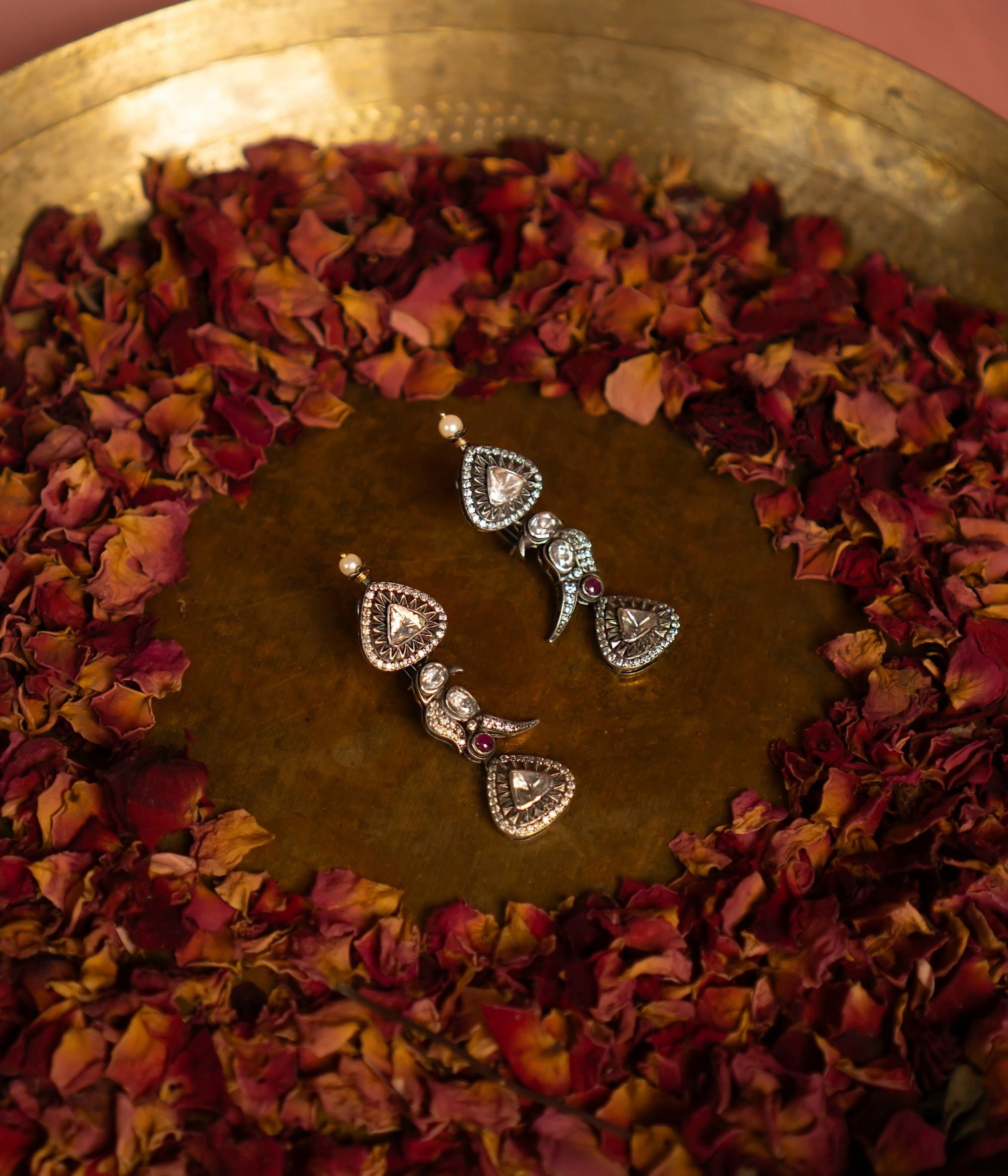 Elegant Ember Earrings in silver and dark antique gold for festive and bridal wear