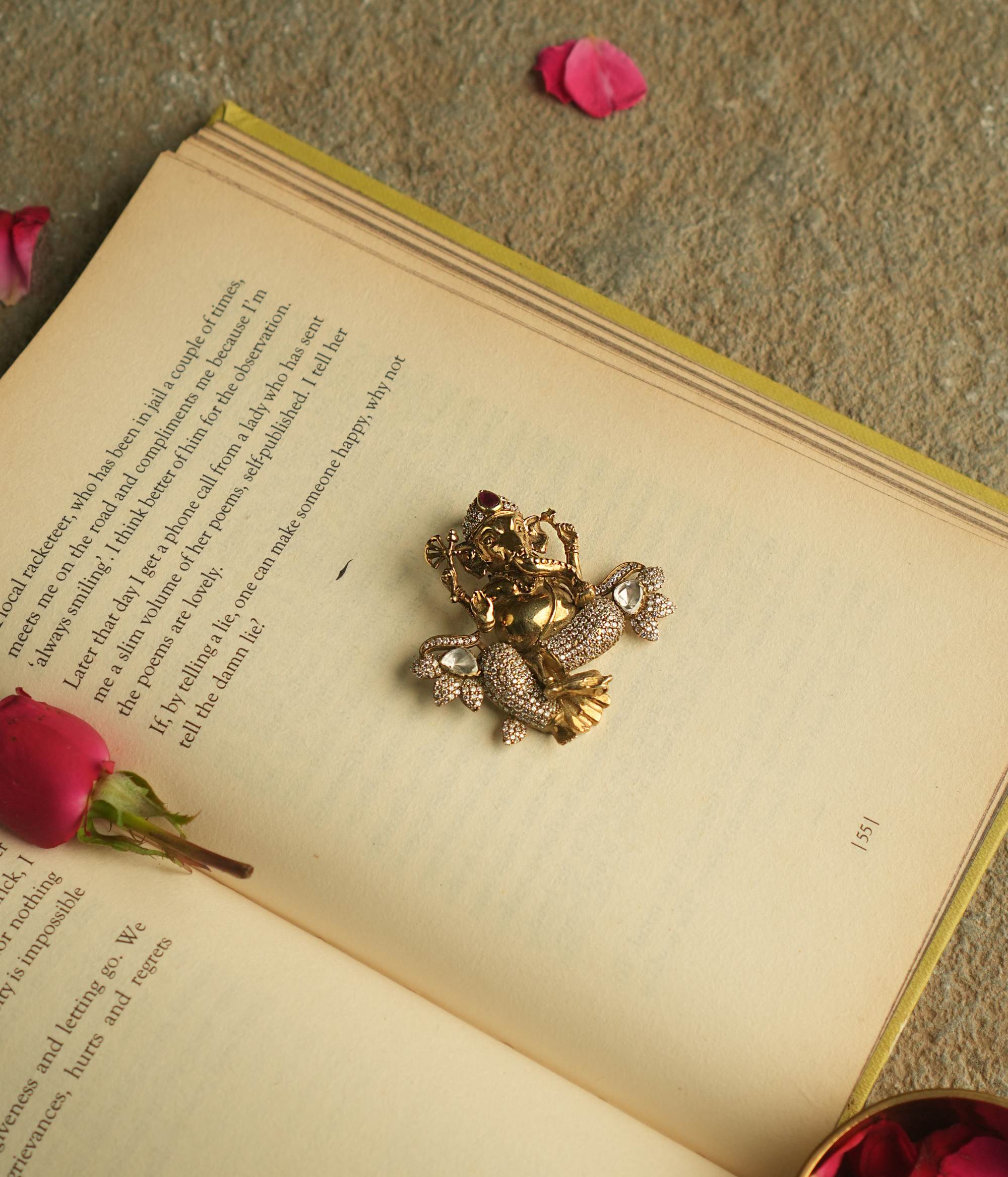 Adorn yourself with the sacred charm of this gold-plated silver pendant, featuring the revered Lord Ganesh motif, radiating grace and blessings.