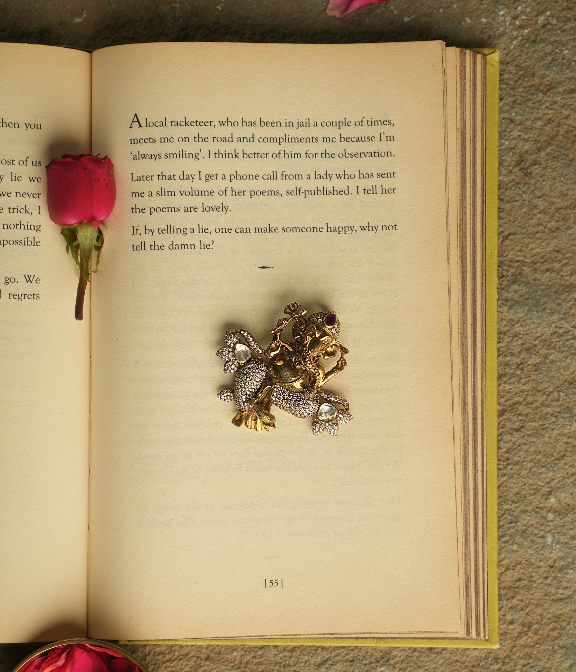Adorn yourself with the sacred charm of this gold-plated silver pendant, featuring the revered Lord Ganesh motif, radiating grace and blessings.