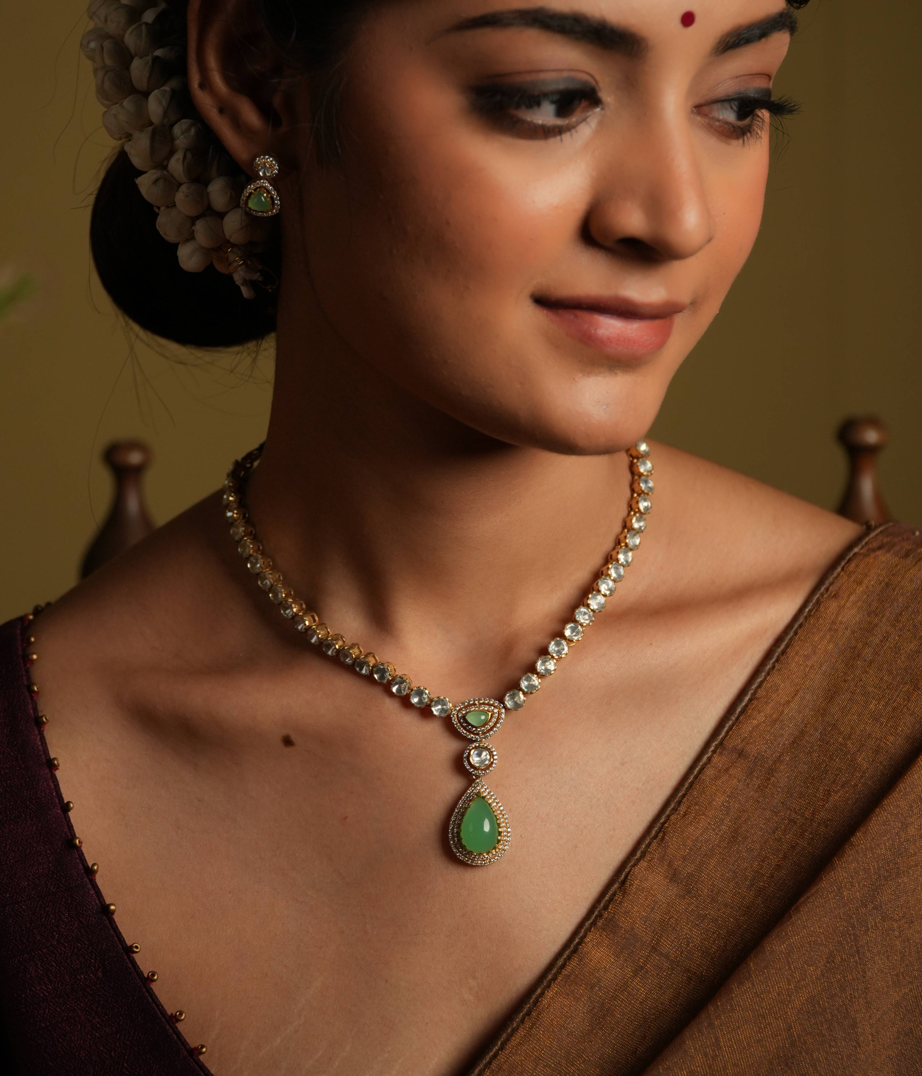 Antique-finish Gamya Necklace plated in dark gold with multi-stones