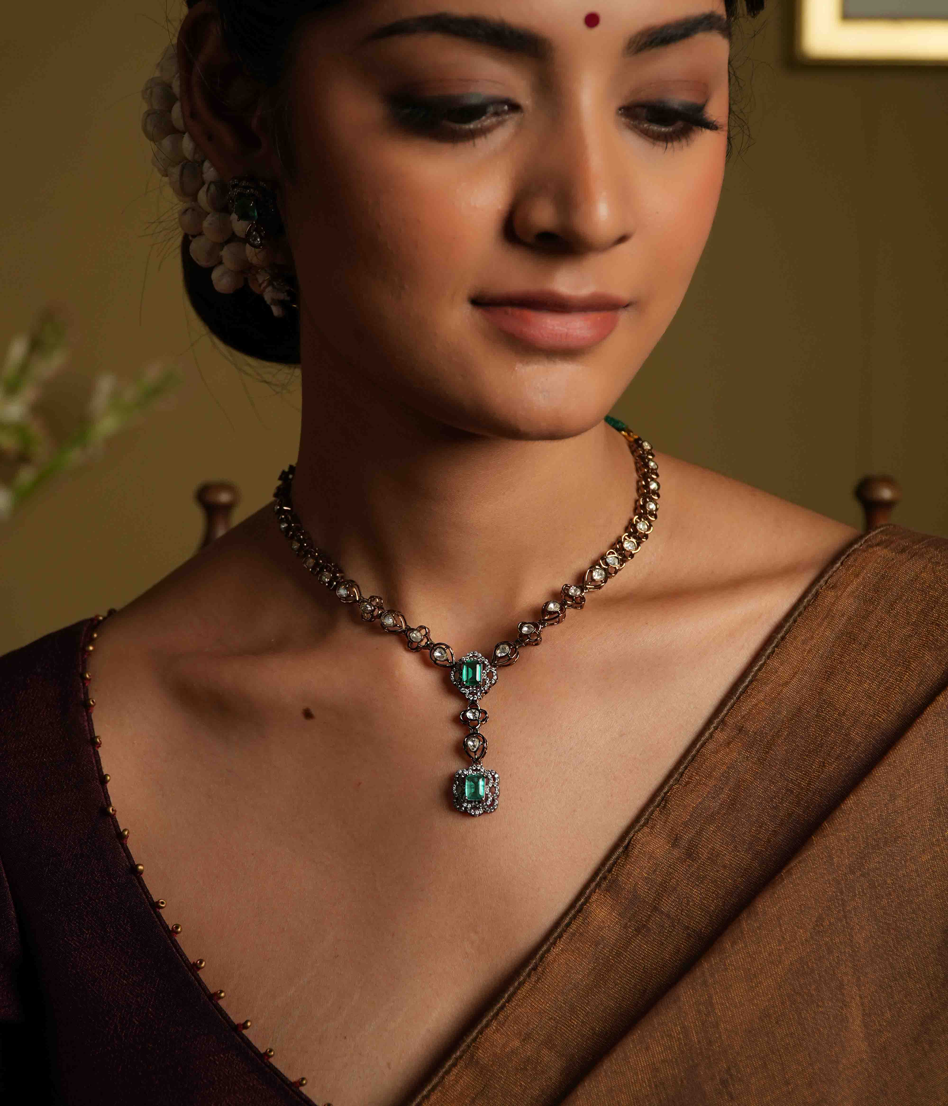 Handmade Victorian-style necklace of 92.5 sterling silver with 14ct dark antique gold plating, featuring polki and CZ stones, accented with a green gemstone and a Victorian finish.
