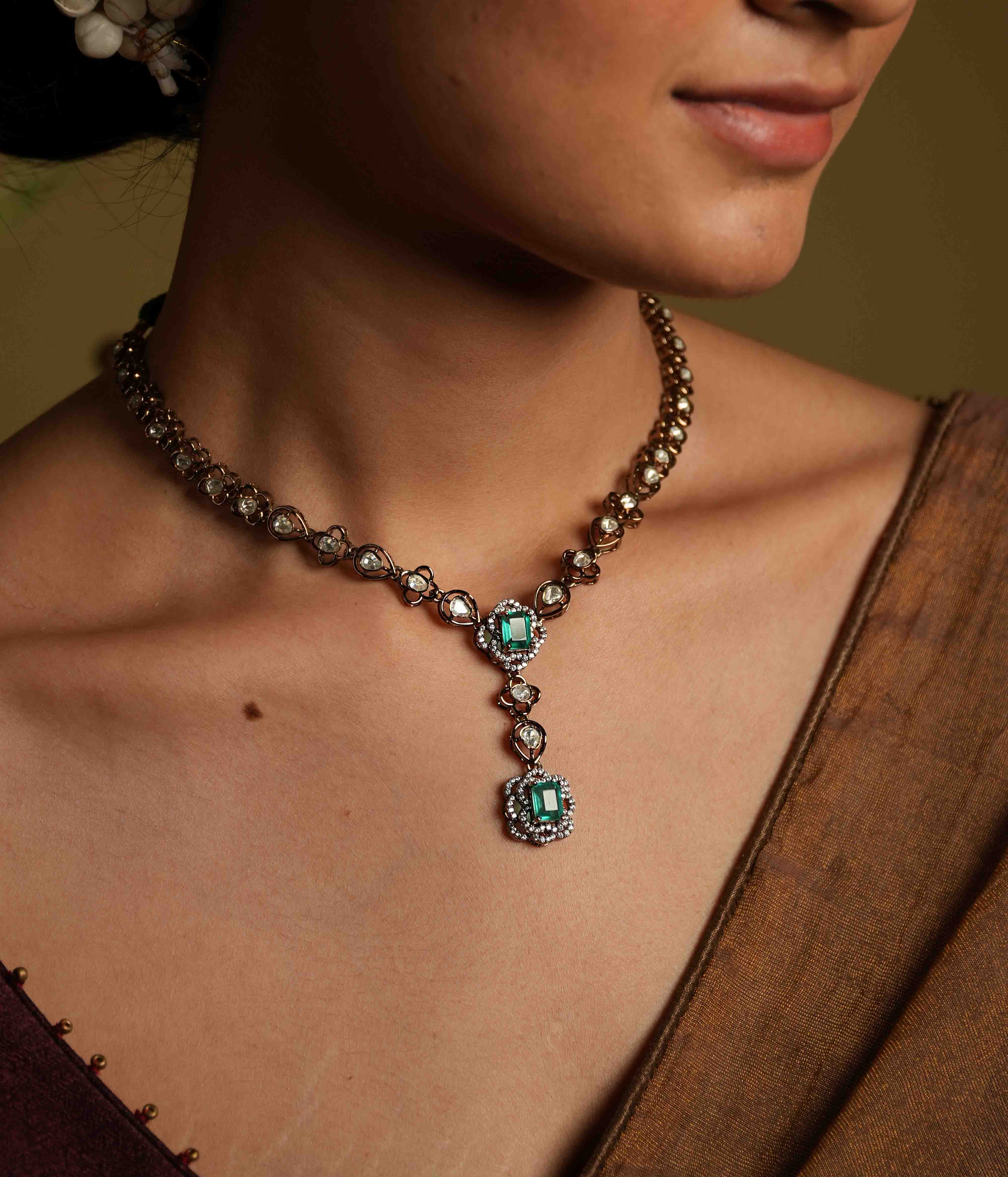 Handmade Victorian-style necklace of 92.5 sterling silver with 14ct dark antique gold plating, featuring polki and CZ stones, accented with a green gemstone and a Victorian finish.