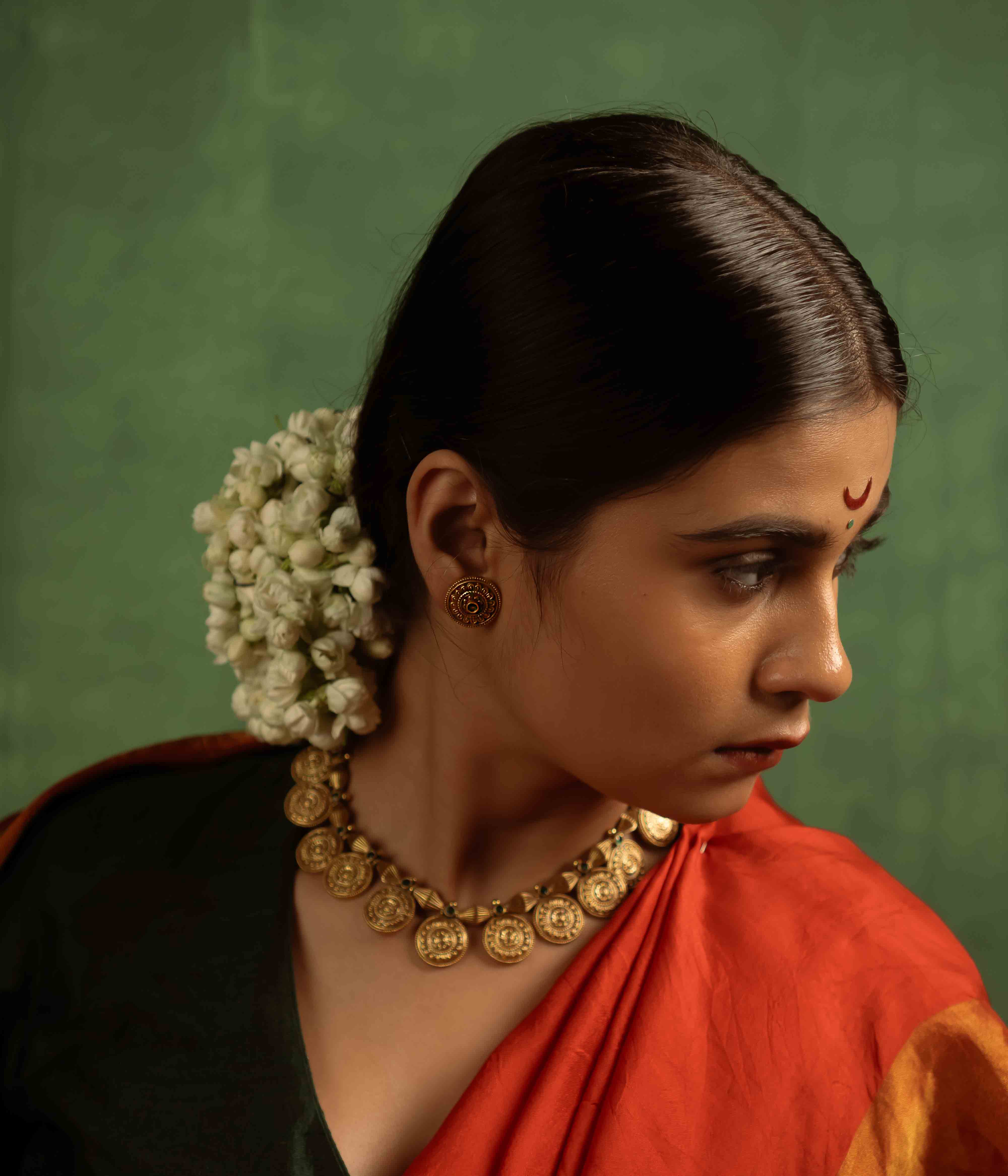 Sacred whispers captured! Gulbahar earrings (gold-plated silver) radiate the essence of Kohlapuri heritage, blending spiritual elegance with modern allure.