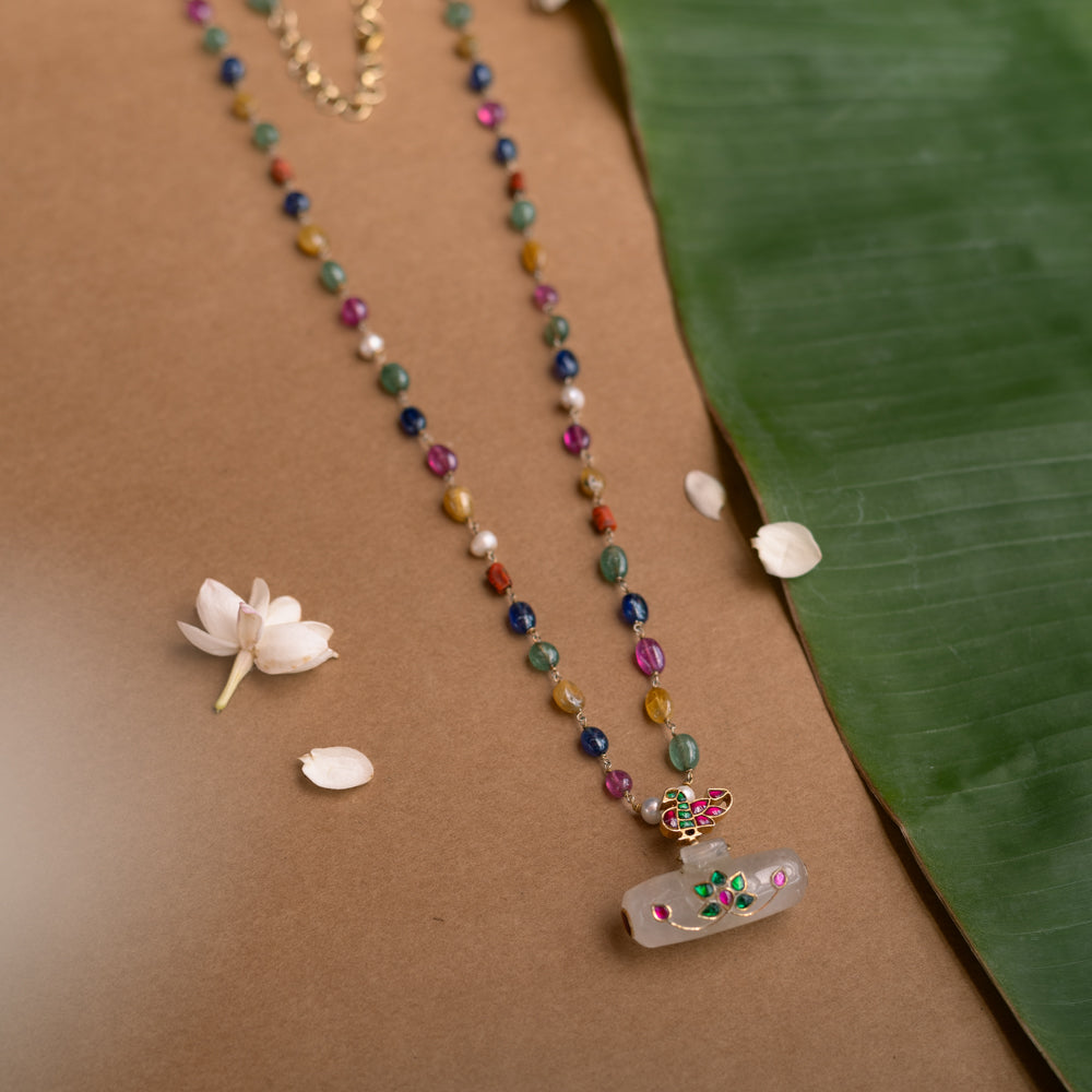 Hue Collection Celestial Harmony Necklace with multi-colored gemstone beads and floral enamel pendant.