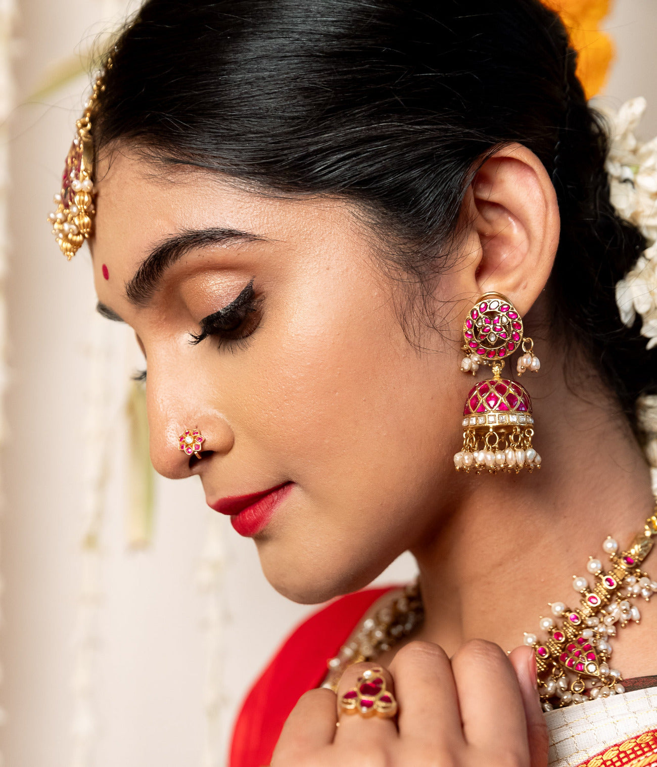 Red and white kundan stone jhumka earrings handmade in silver