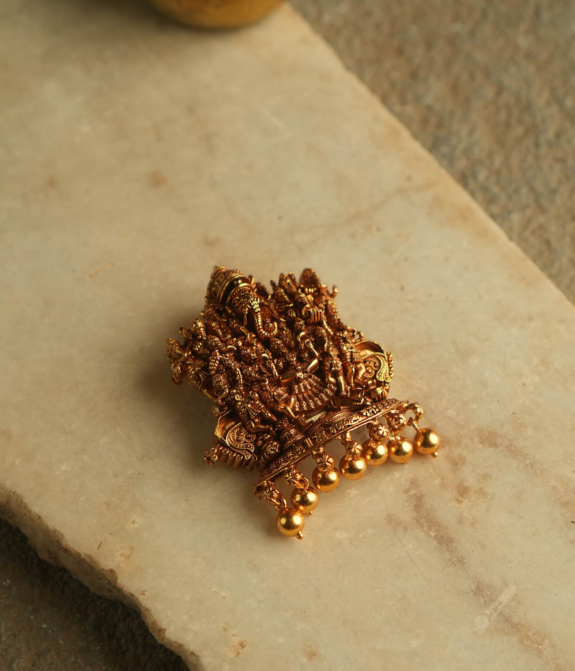 Embrace prosperity and conquer obstacles with graceful elegance in this beautifully handcrafted gold-plated silver pendant. At its heart, a serene depiction of Lord Ram, Sita, and Lakshman embodies timeless devotion and harmony.