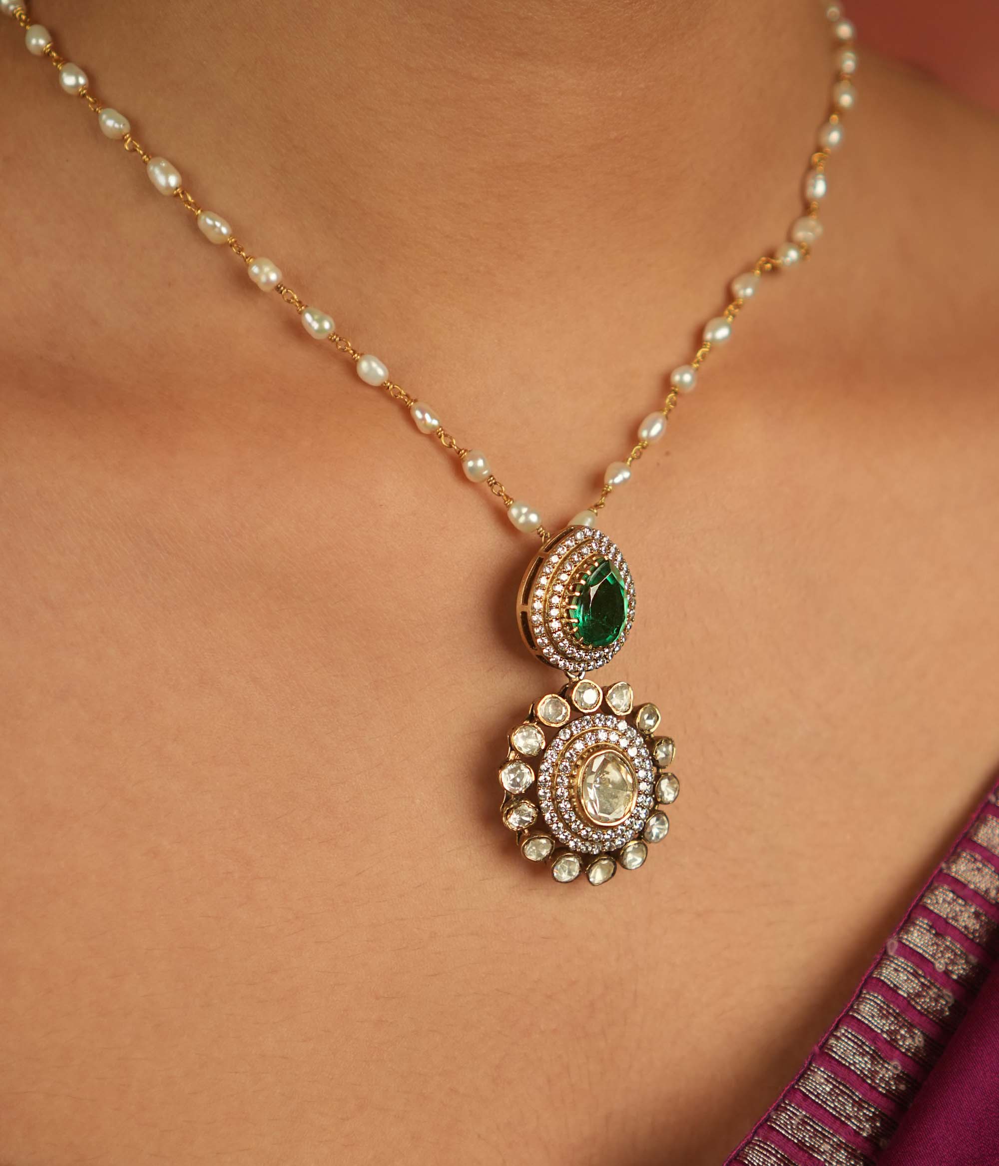 A verdant symphony reborn! Emerald and Moissanite pendant: Lush beauty meets cosmic brilliance. Eternal elegance for the modern woman.
