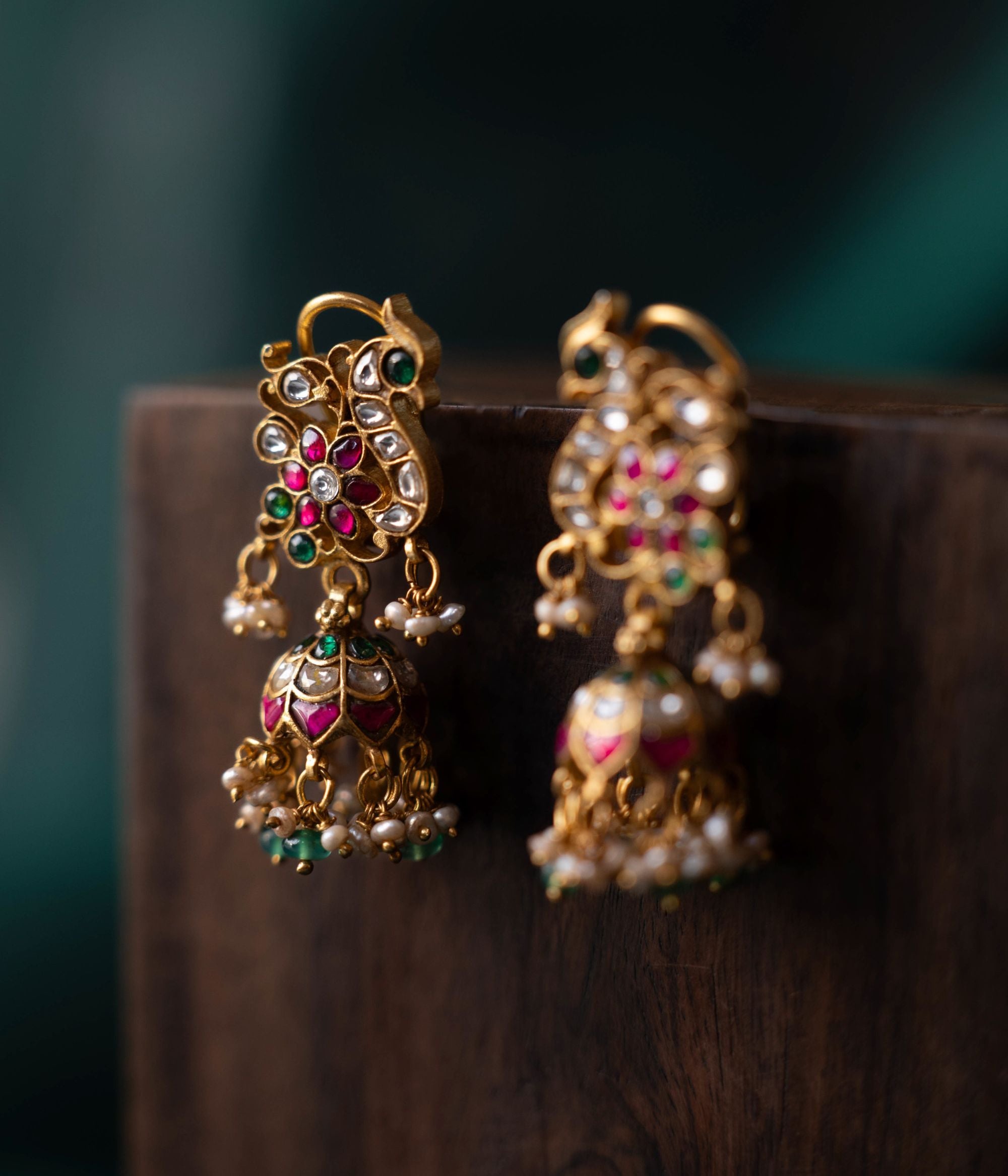 Close-up of Madhurika Silver Jhumkas with Kundan and Pearl Detailing