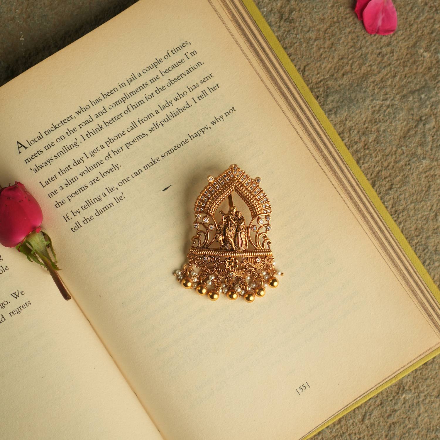 This exquisite pendant captures the divine union of Krishna and Radha, symbolizing their eternal love with spiritual radiance. A timeless piece that embodies devotion and celestial beauty.