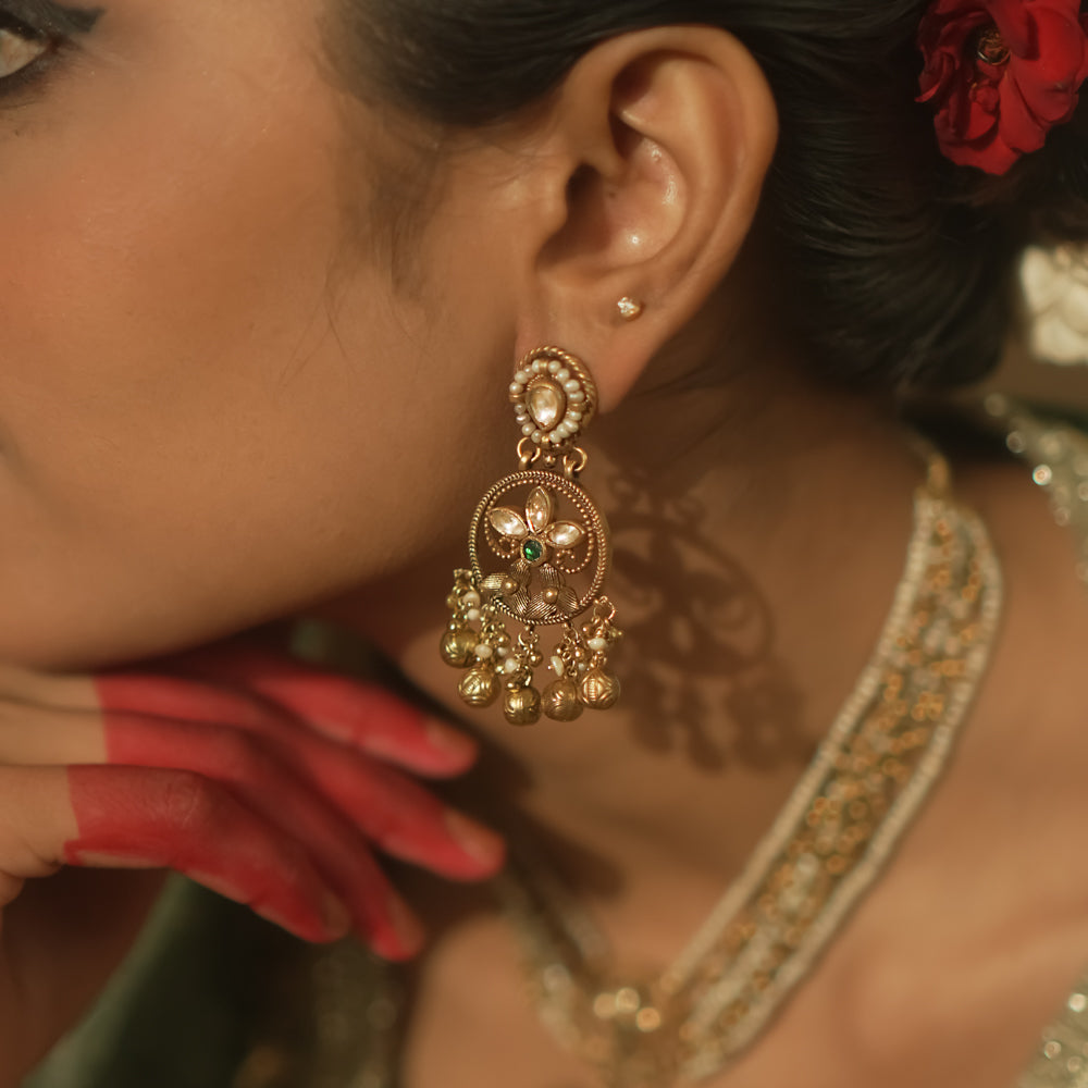 A delicate green gem, a whisper of traditional elegance.