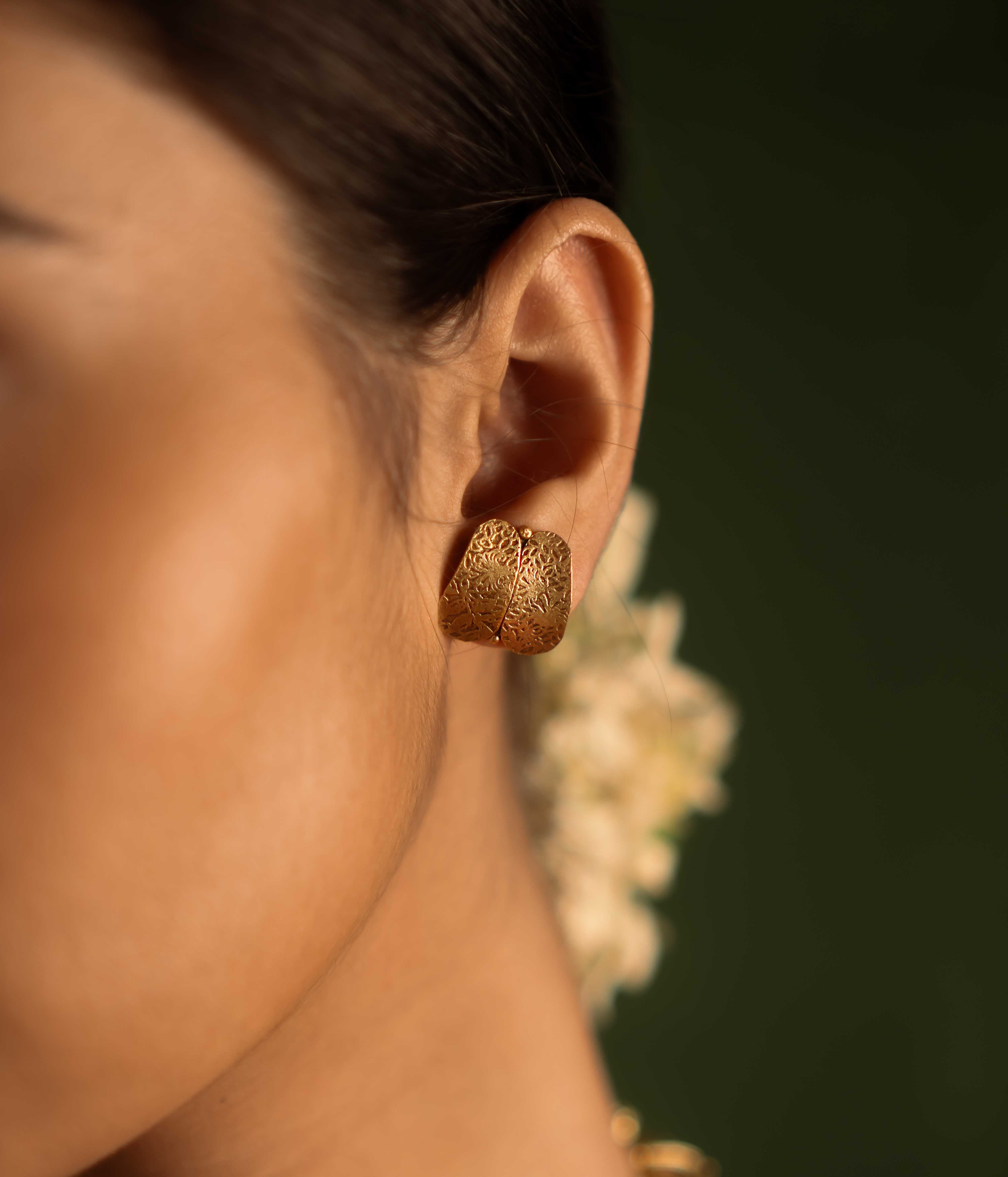 Timeless tradition reimagined. Jaswand stud earrings: Gold-plated silver with intricate craftsmanship, honoring heritage and adding elegance to the modern woman.