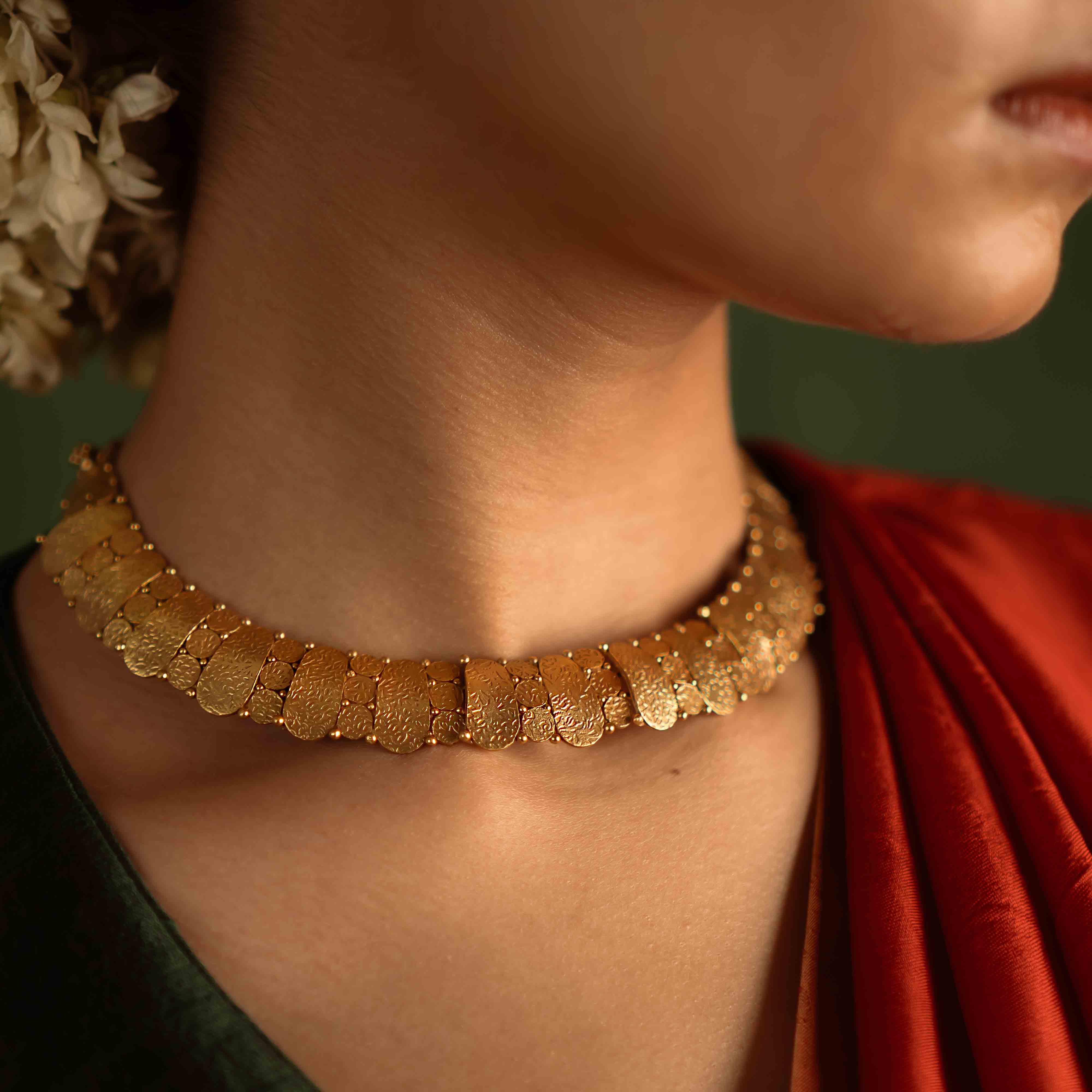 Timeless tradition reimagined. Jaswand necklace: Gold-plated silver with intricate craftsmanship, celebrating heritage and perfect for the modern bride.