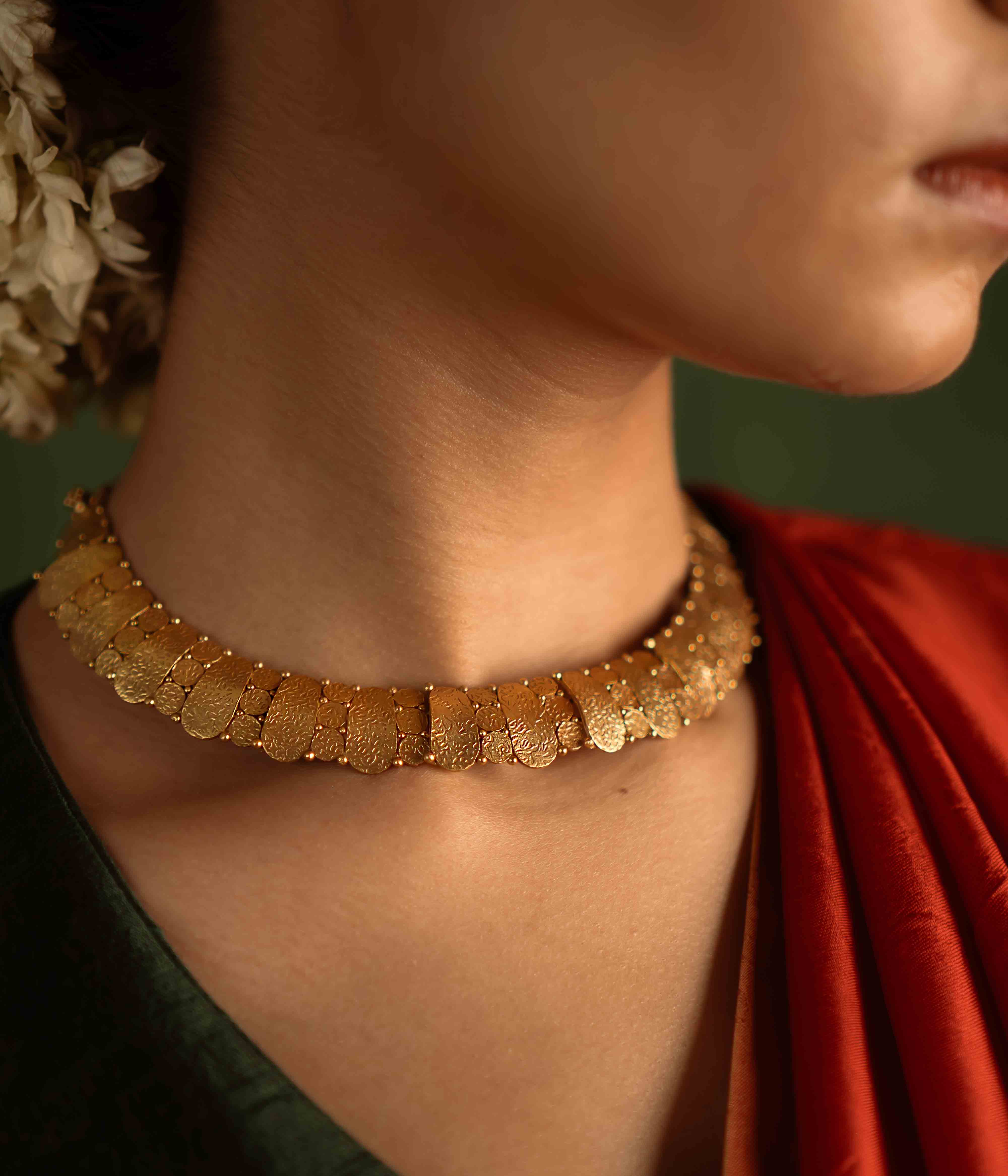Timeless tradition reimagined. Jaswand necklace: Gold-plated silver with intricate craftsmanship, celebrating heritage and perfect for the modern bride.