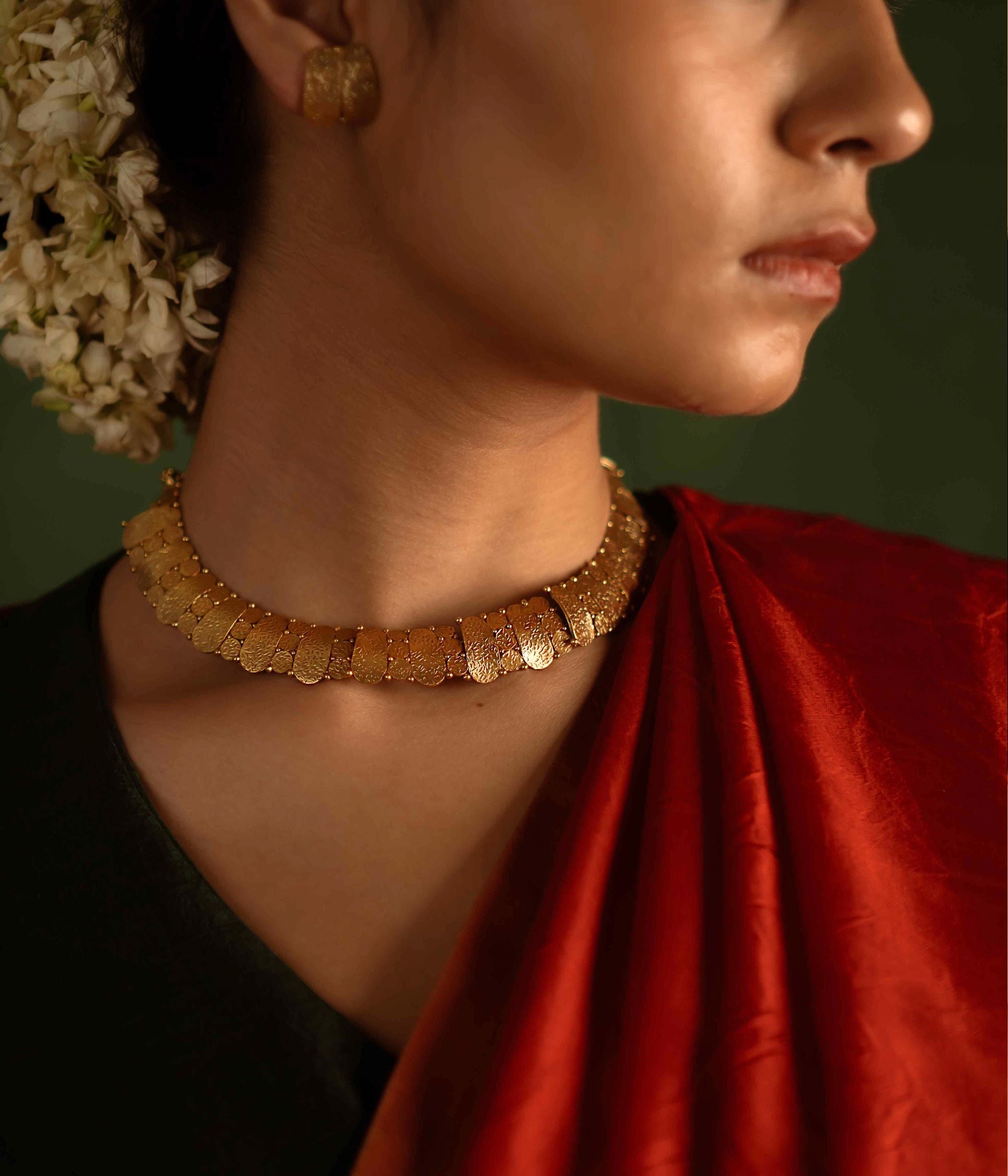 Timeless tradition reimagined. Jaswand necklace: Gold-plated silver with intricate craftsmanship, celebrating heritage and perfect for the modern bride.