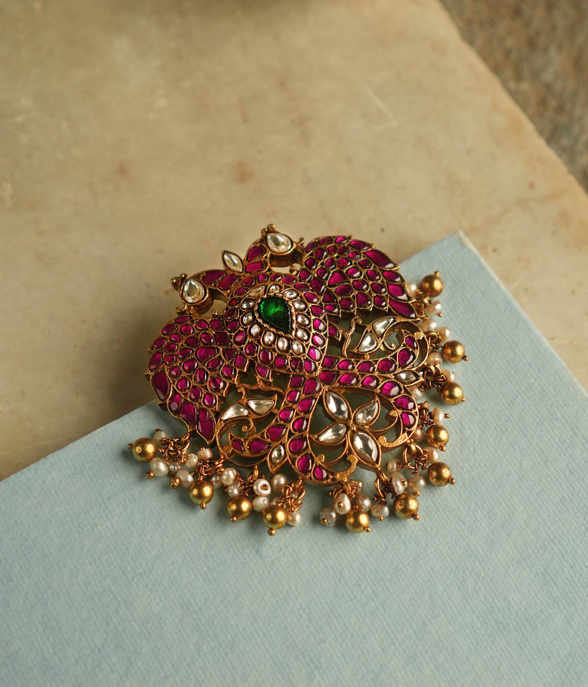 Traditional silver gold plated pendant with red and green kundan stones