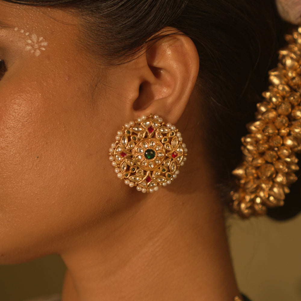 Floral Kundan ear studs with pearls—delicate, vibrant, and full of gentle morning charm.