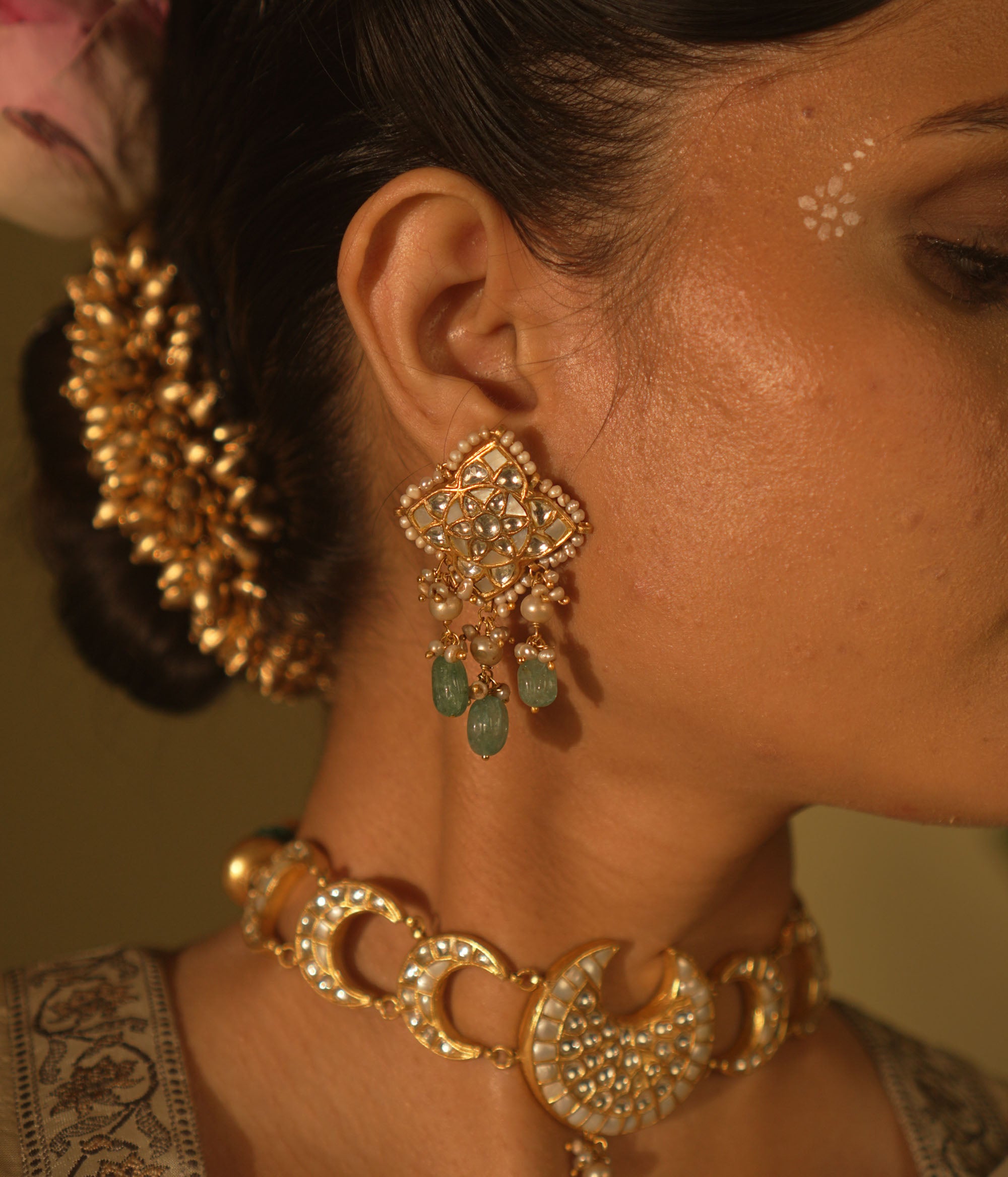 Close-up of Kaarina Earrings showing Kundan stones, Polki, and pearls