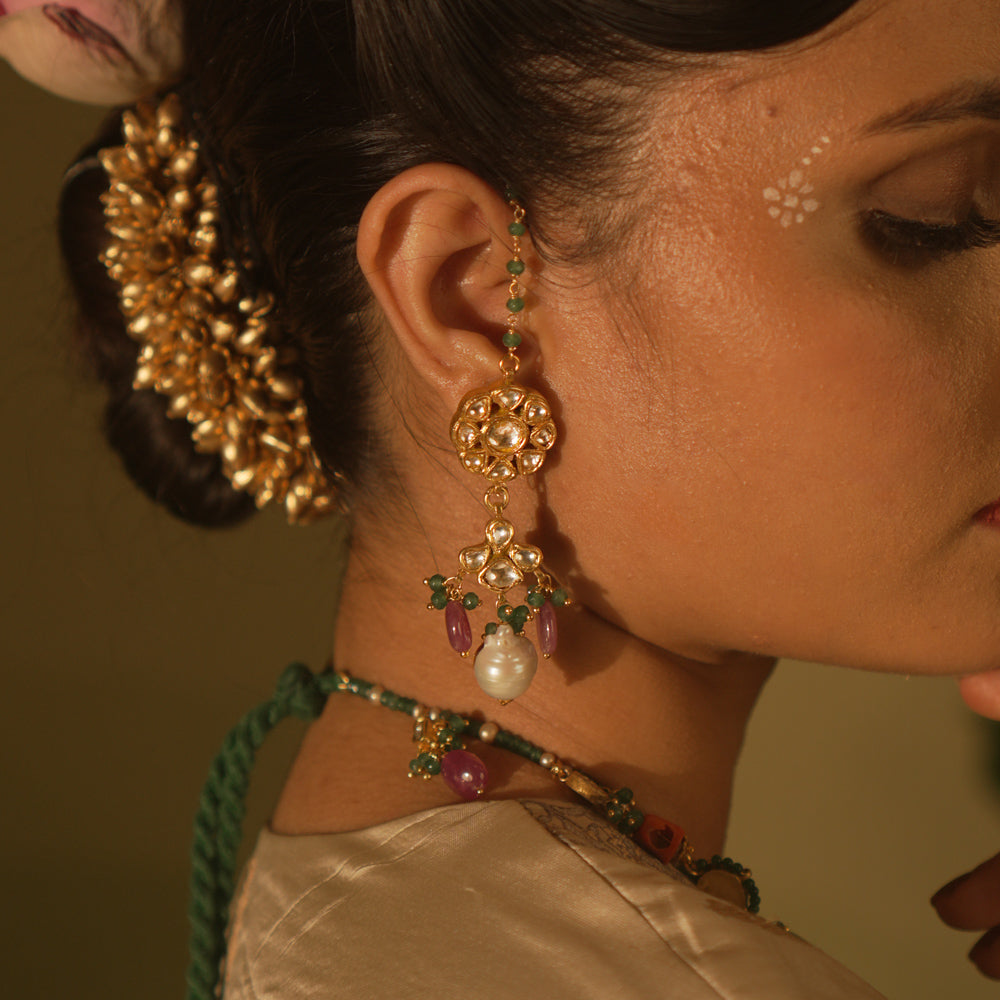 Nature-inspired Polki earrings with abstract buds and pearls—organic grace and luminous charm.