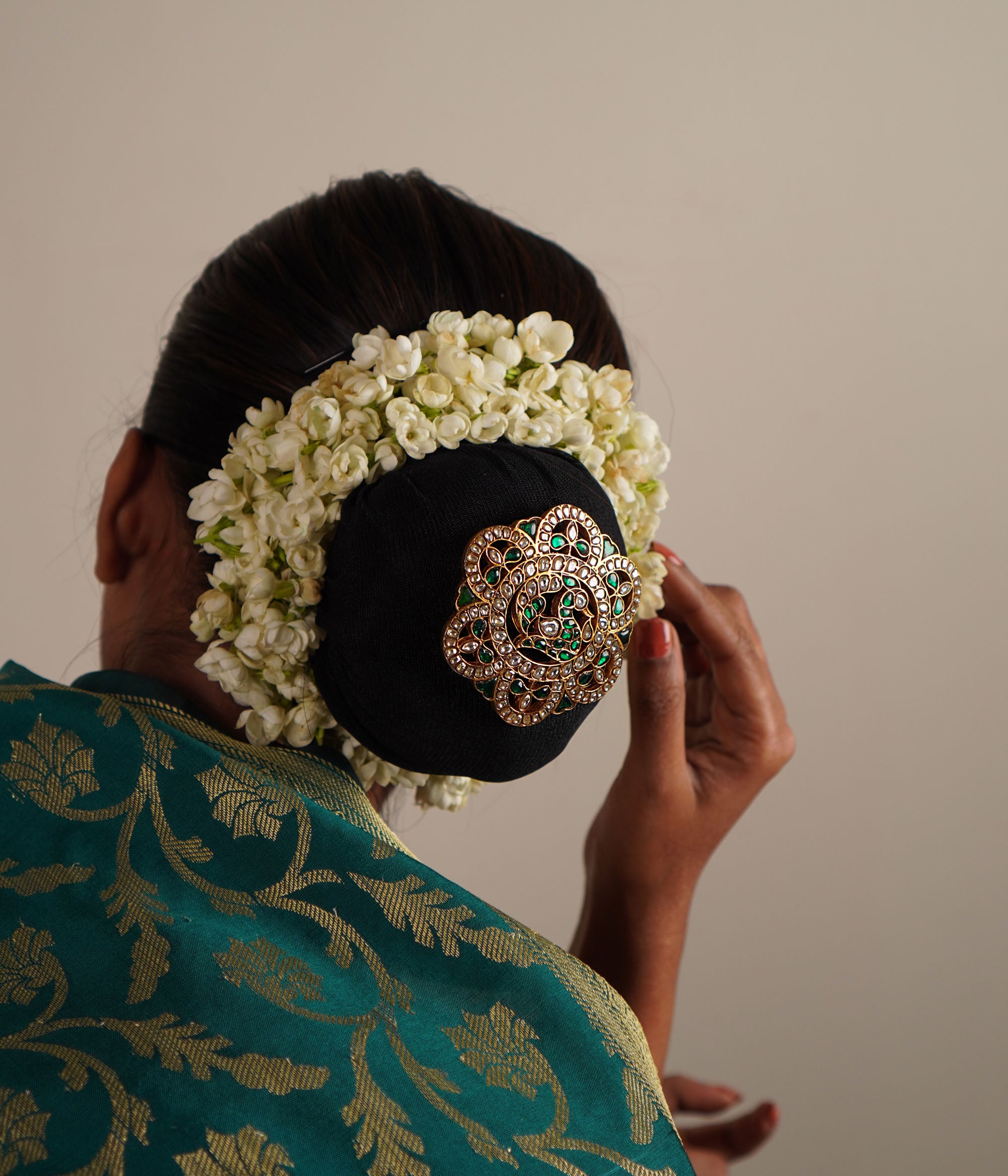 Elevate your look with this exquisite hairpin, featuring a regal peacock motif in gold-plated silver, adorned with radiant kundan stones for a touch of timeless elegance.