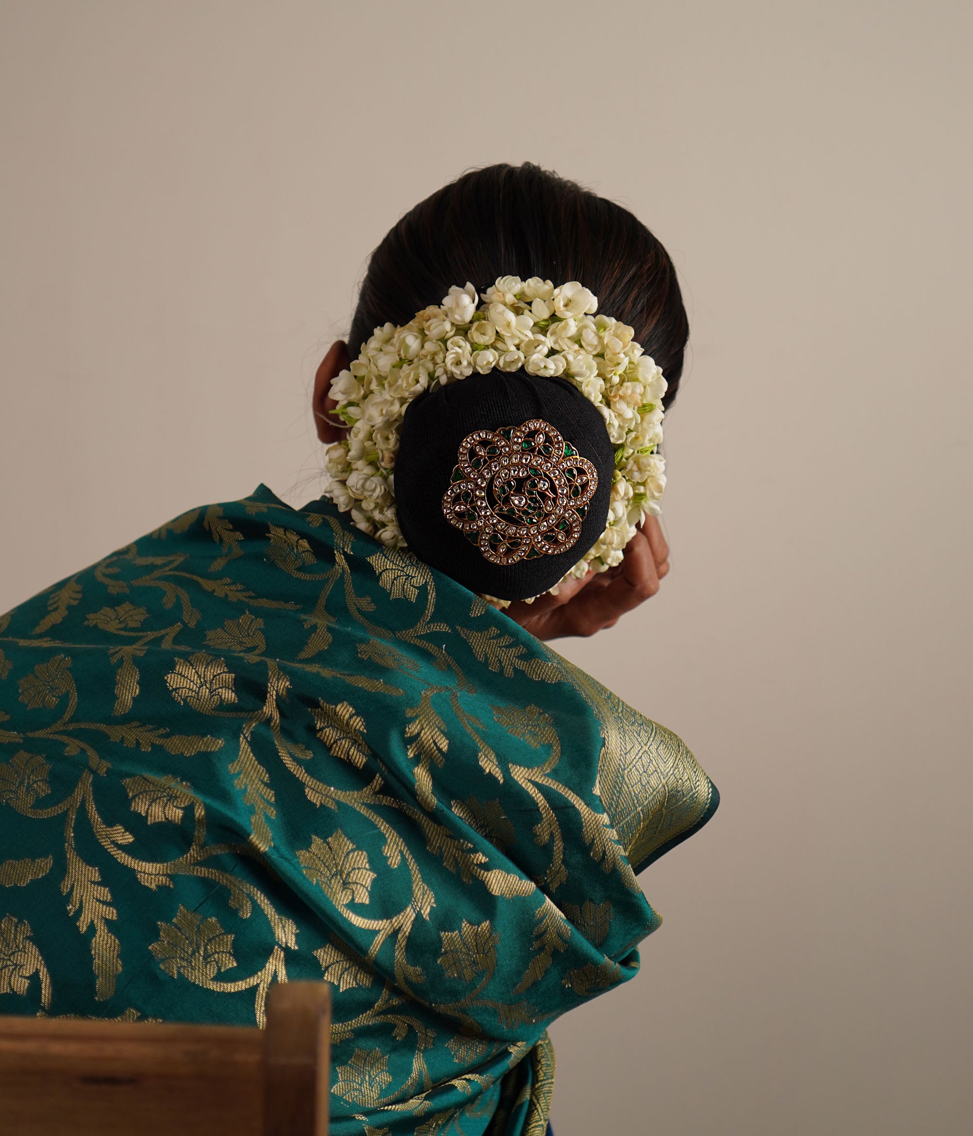 Elevate your look with this exquisite hairpin, featuring a regal peacock motif in gold-plated silver, adorned with radiant kundan stones for a touch of timeless elegance.