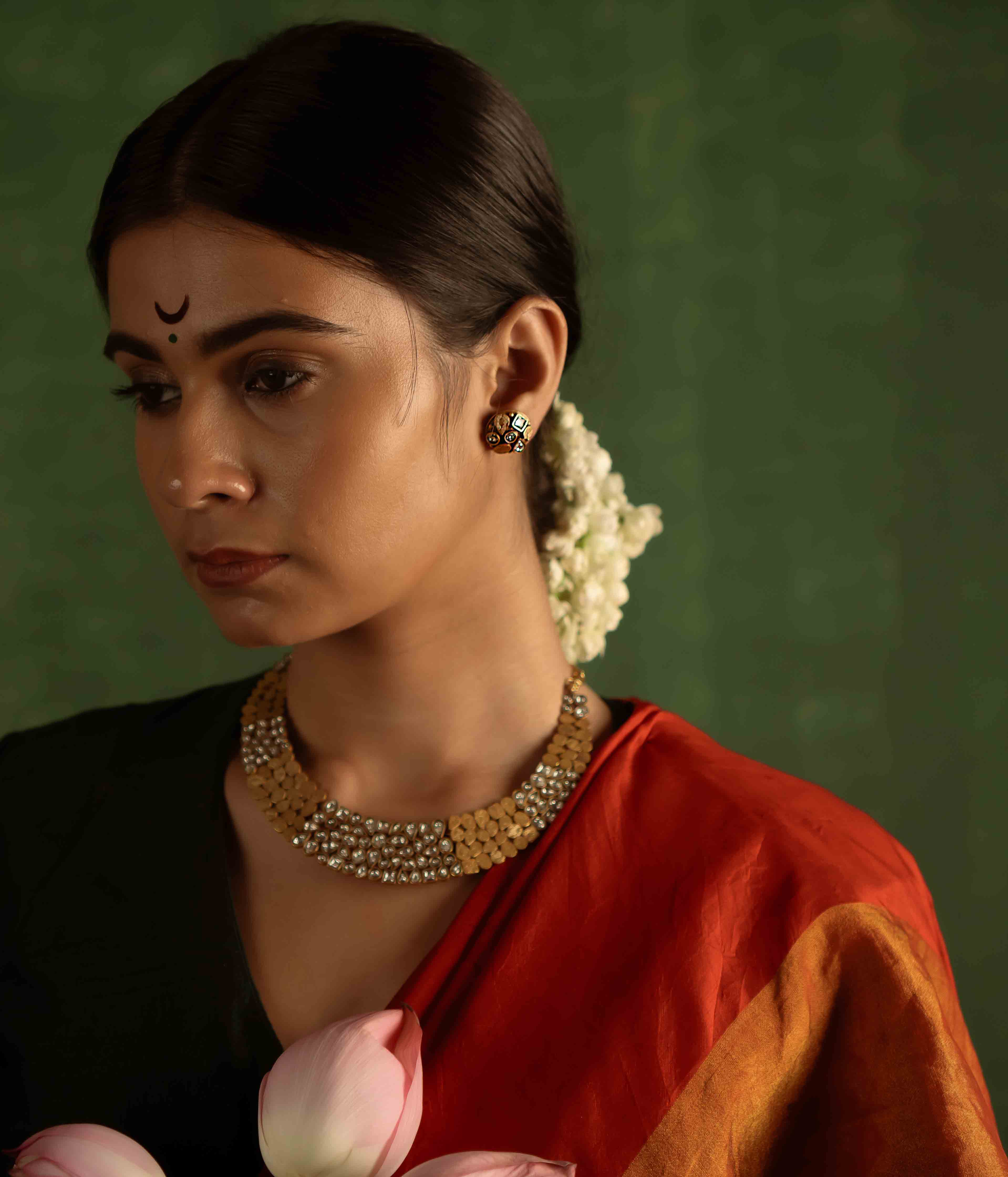 The Kaeya Earrings (gold-plated silver) radiate timeless elegance, with sparkling Polki stones that carry the whispers of heritage into the present.